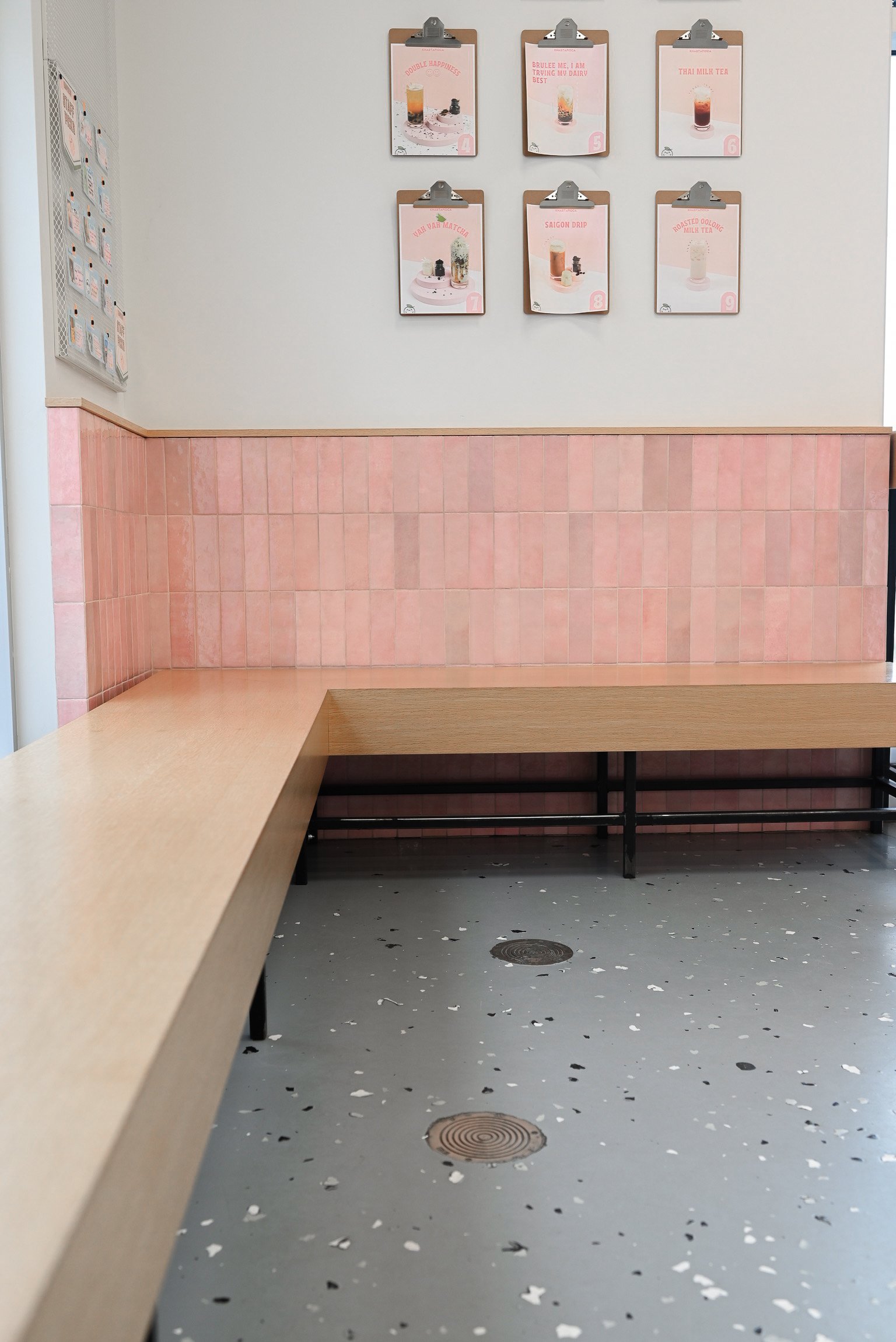 This bubble tea shop blends playful charm with sporty flair. Pink tiles, cute basketballs, and pastel graphics create a fresh, inviting vibe perfect for a fun boba break.