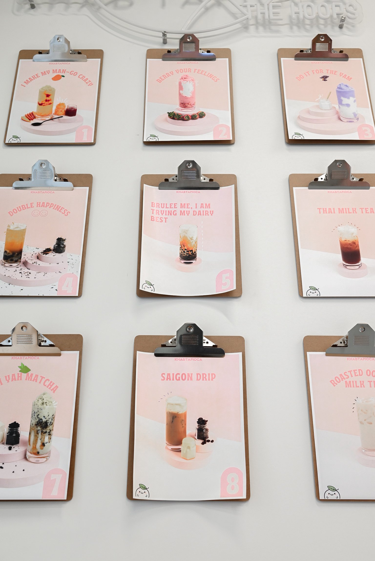 This bubble tea shop blends playful charm with sporty flair. Pink tiles, cute basketballs, and pastel graphics create a fresh, inviting vibe perfect for a fun boba break.