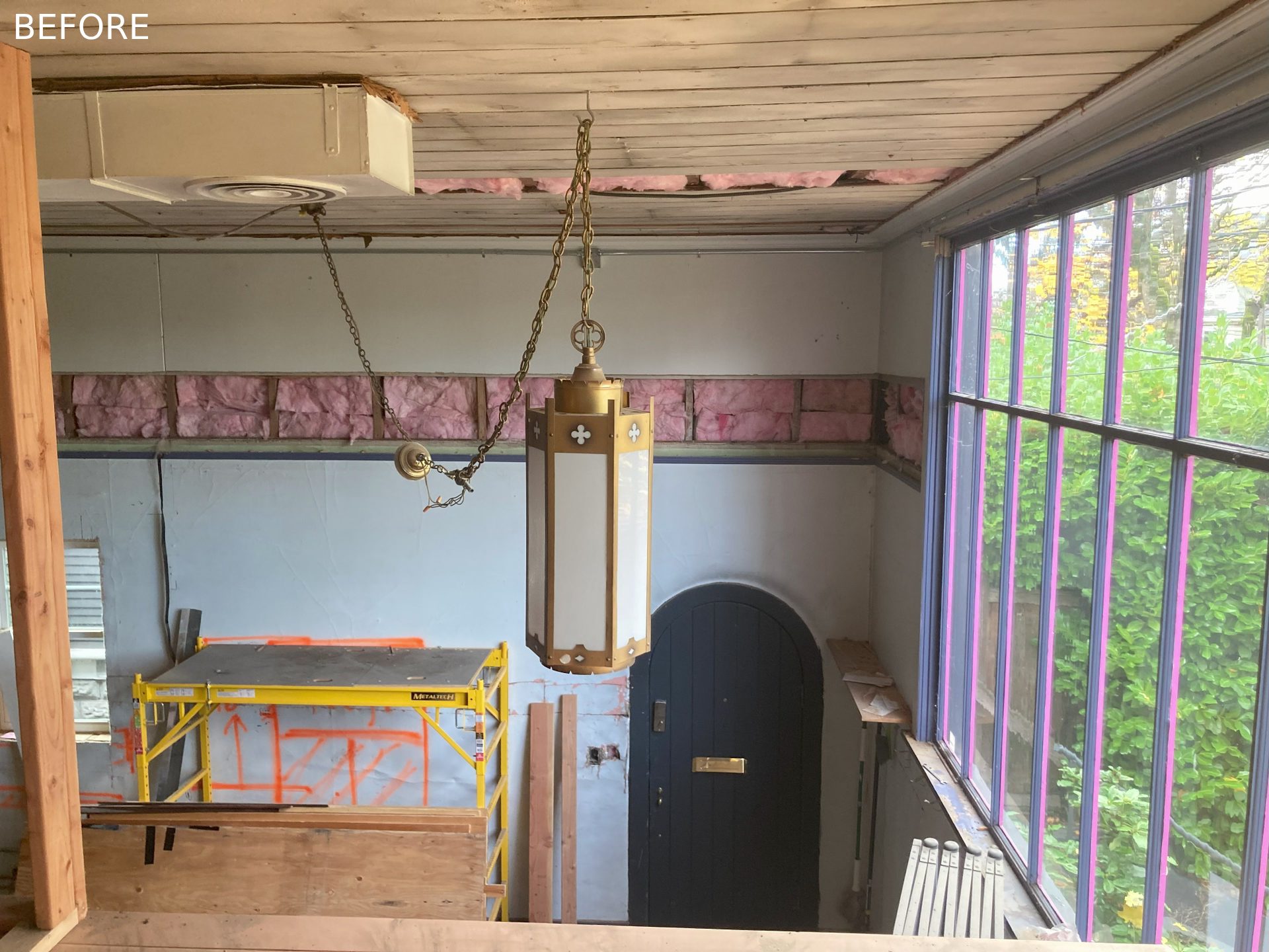 Before photo - a church / art studio transformed into a 2 bedroom home.