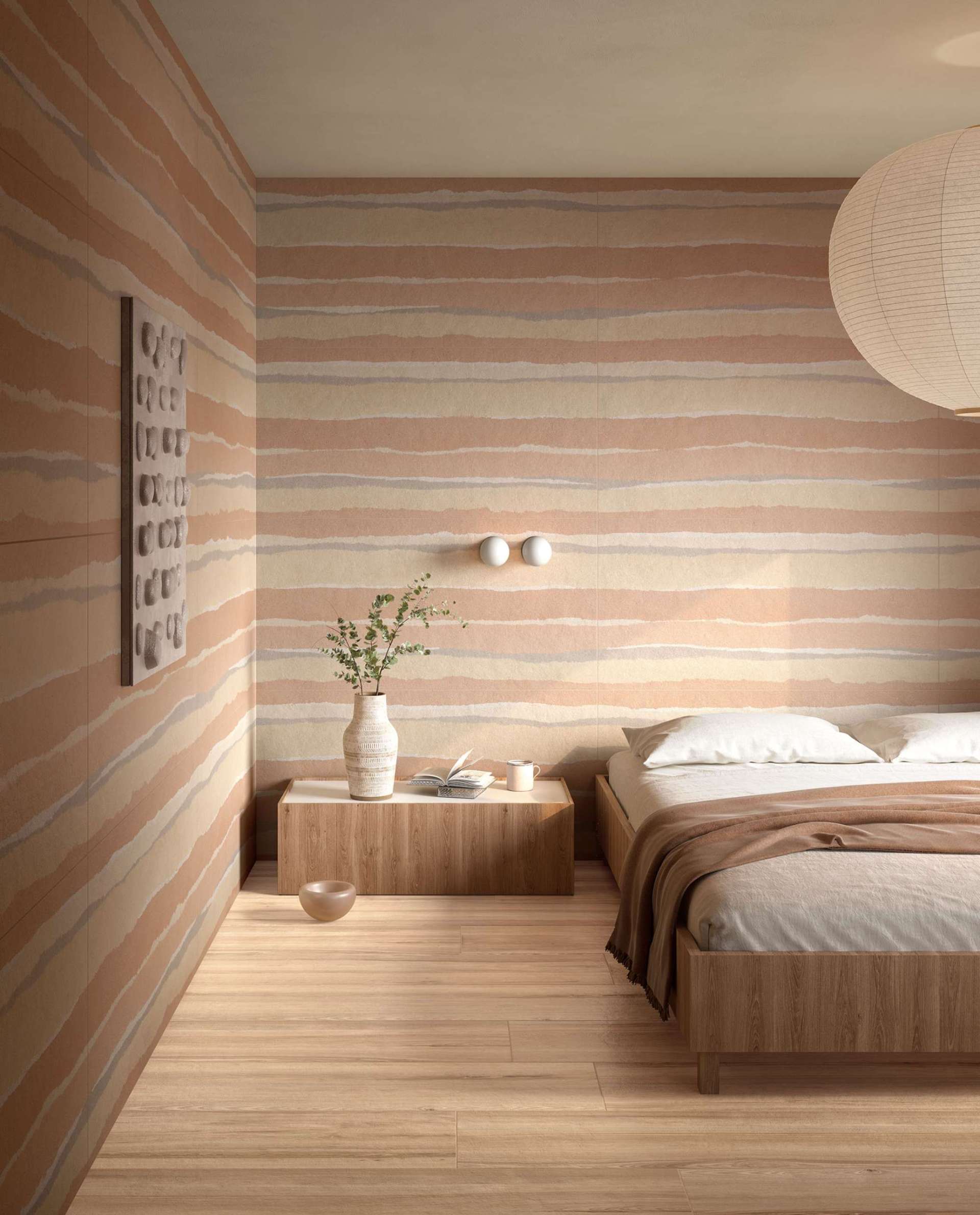 This tranquil bedroom blends soft terracotta and sandy tones in striated tile walls that mimic natural sediment. Perfect for earthy interiors that embrace calm, texture, and modern minimalism.