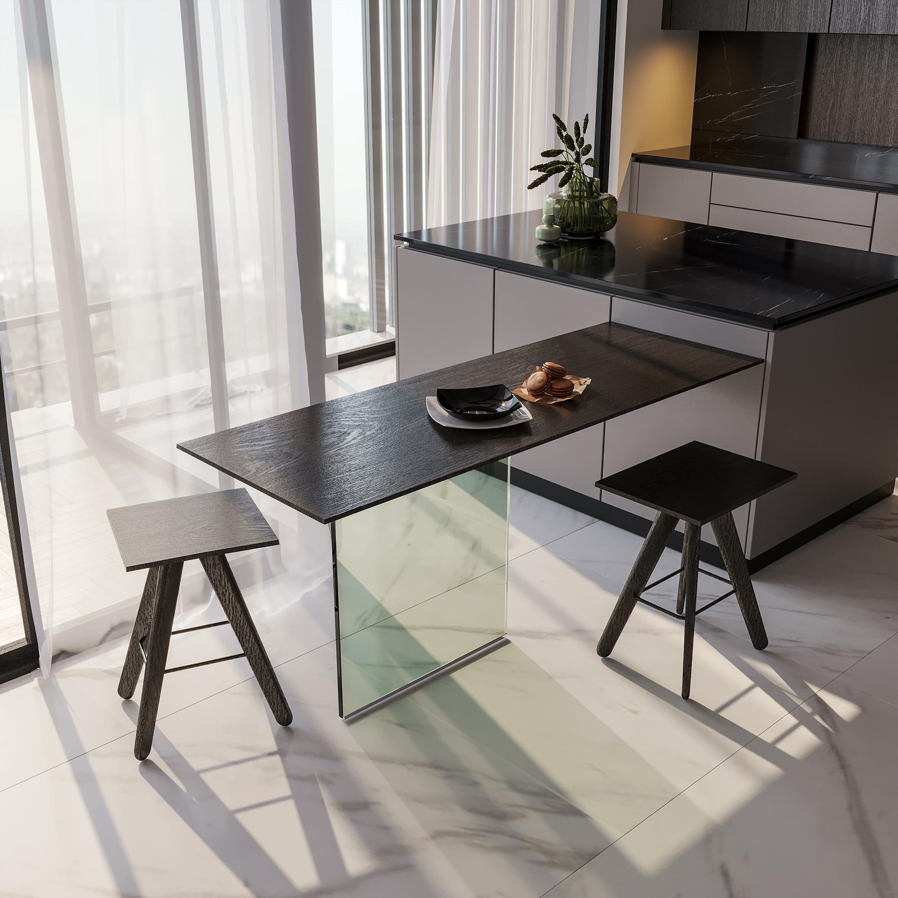 The journey of this dining table began with a client’s request not to cover the window with furniture. Light moves freely beneath it, creating an airy feel, while the soft oak veneer is warm to the touch, and the nearly invisible base enhances the floating illusion.