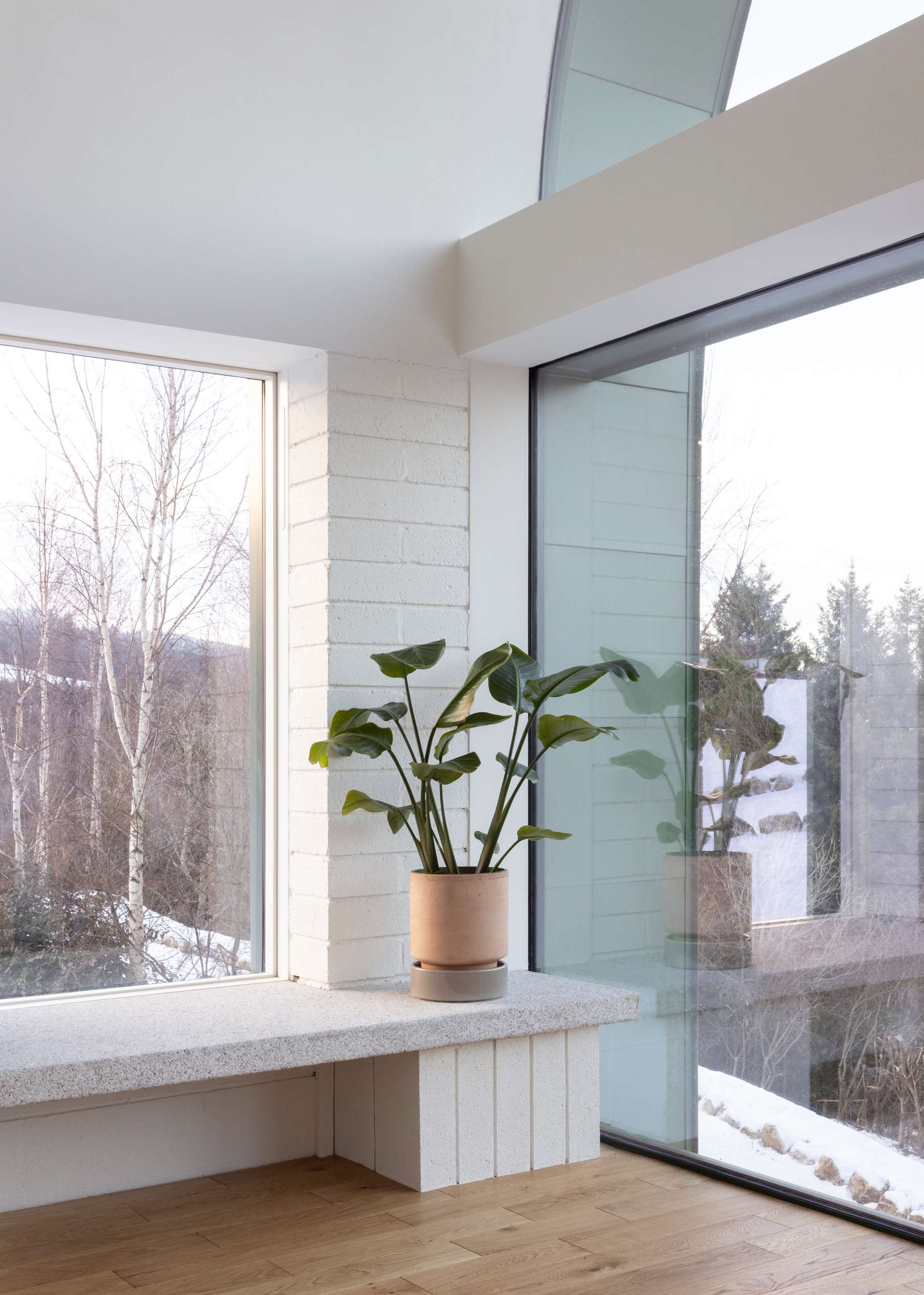 Large openings throughout this home are strategically placed to draw in natural light from morning to evening, and both levels enjoy direct access to the outdoors, an essential feature in this rugged, pastoral setting.
