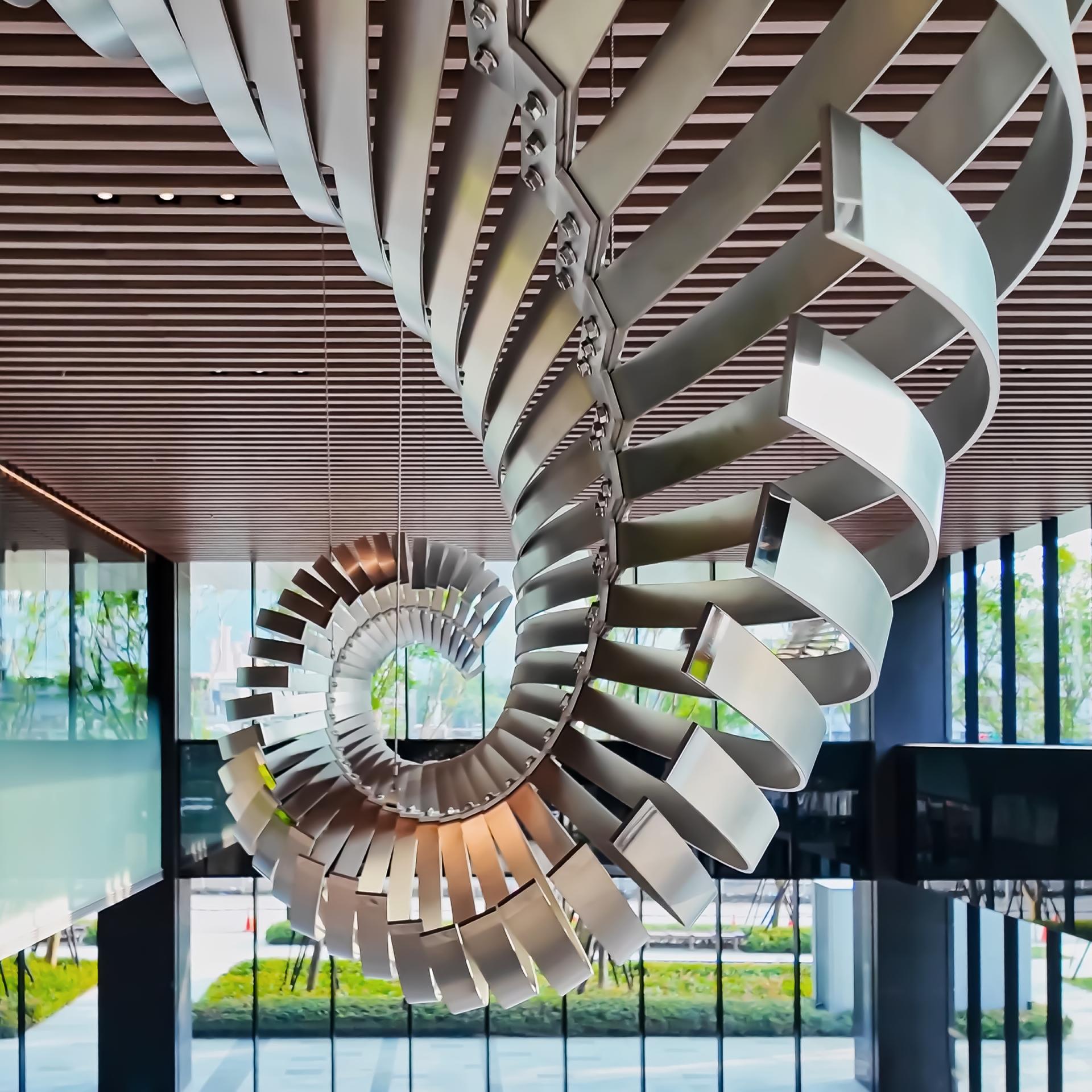 The artwork Spiral Bloom is inspired by the dynamic energy of life and the infinite possibilities of the future. The design draws from natural forms in motion, such as the spiraling patterns found in biological growth, celestial bodies, and fluid dynamics.