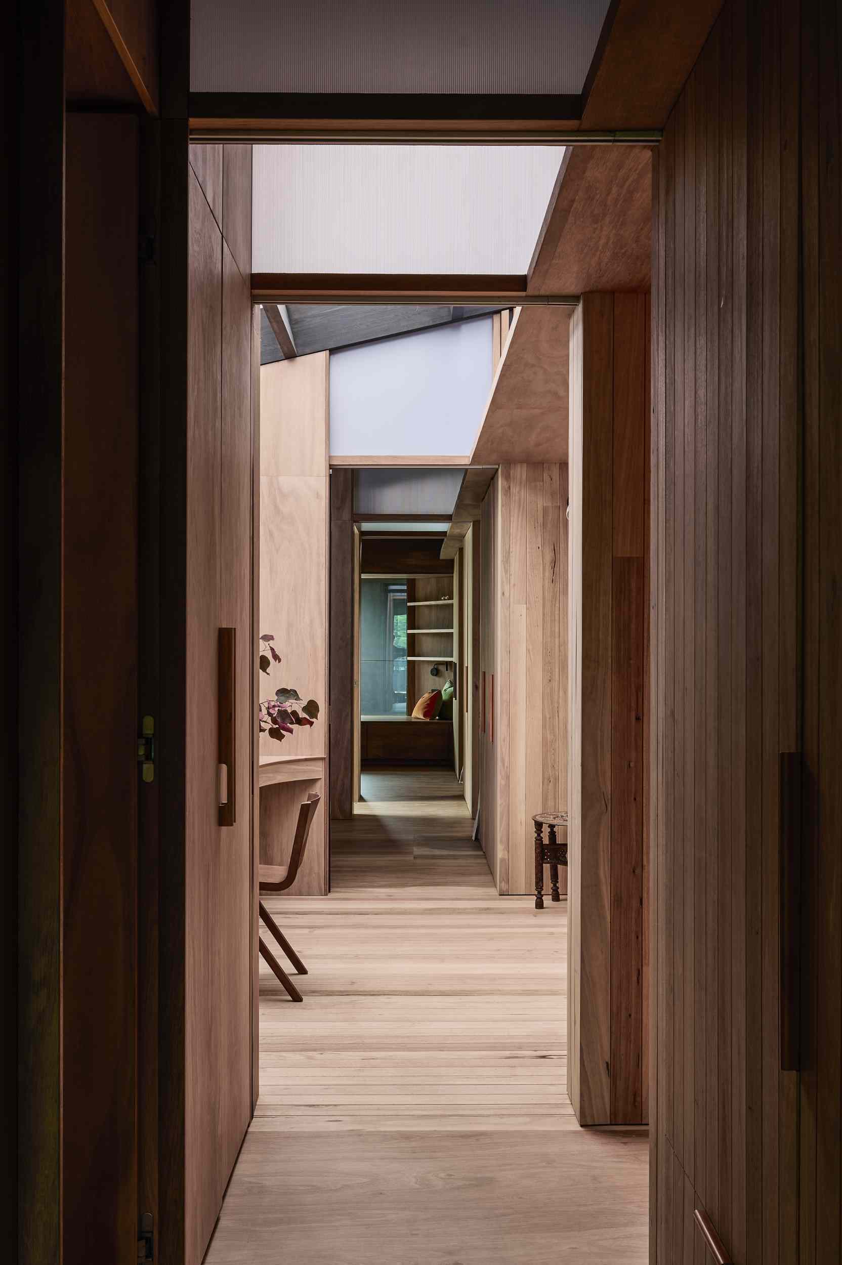 A modern wood-lined hallway.