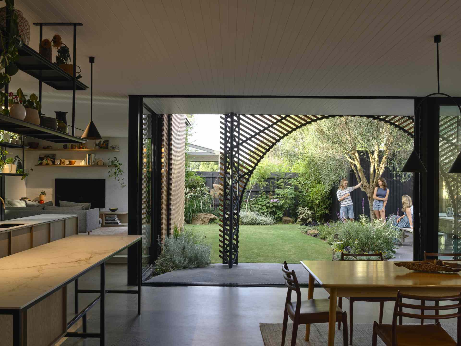 A modern interior that opens up to the garden.