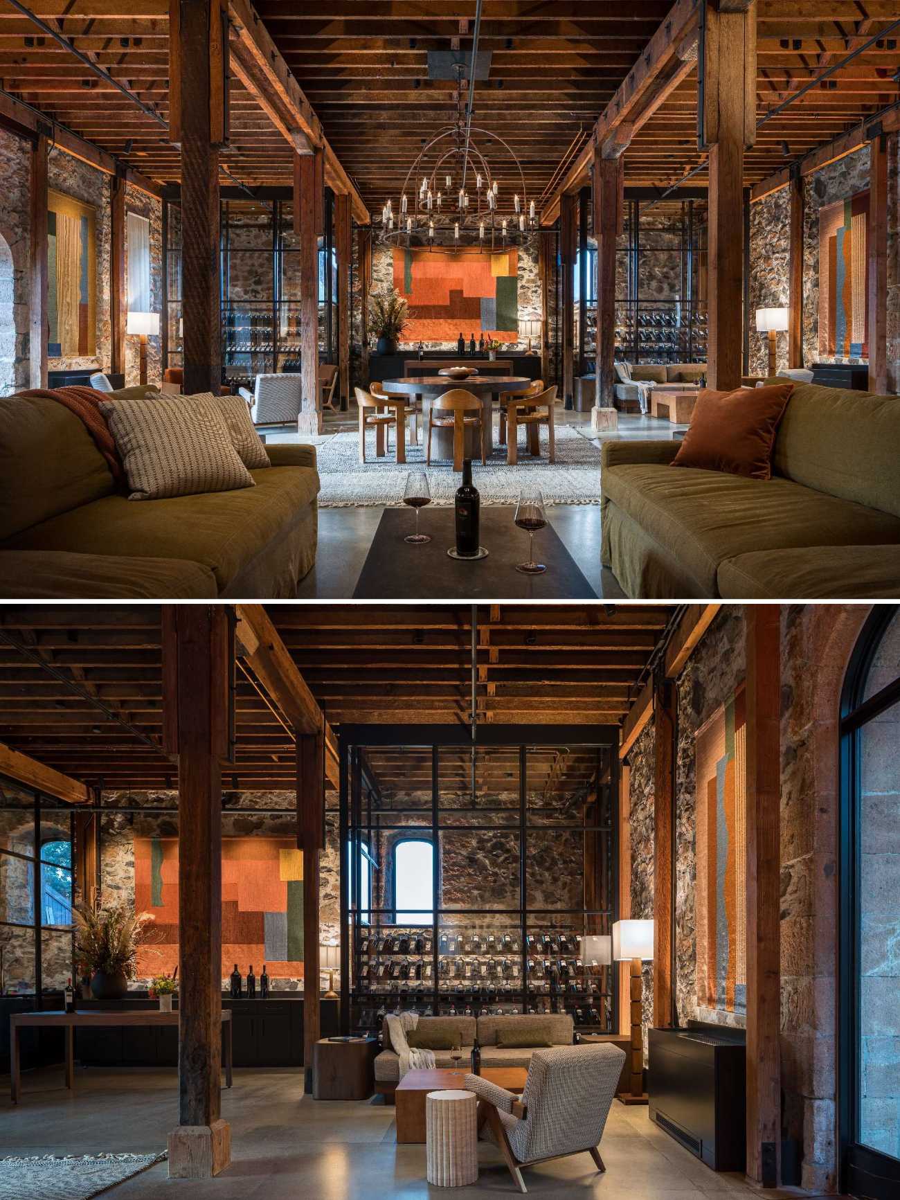 Subtle yet striking, the glass wine storage walls were seamlessly integrated into the architecture, serving as both a functional element and a visual anchor. Their vertical proportions draw the eye upward, emphasizing the building’s original height, while the dark framing adds a clean, modern contrast to the warm, timeworn materials throughout the space.