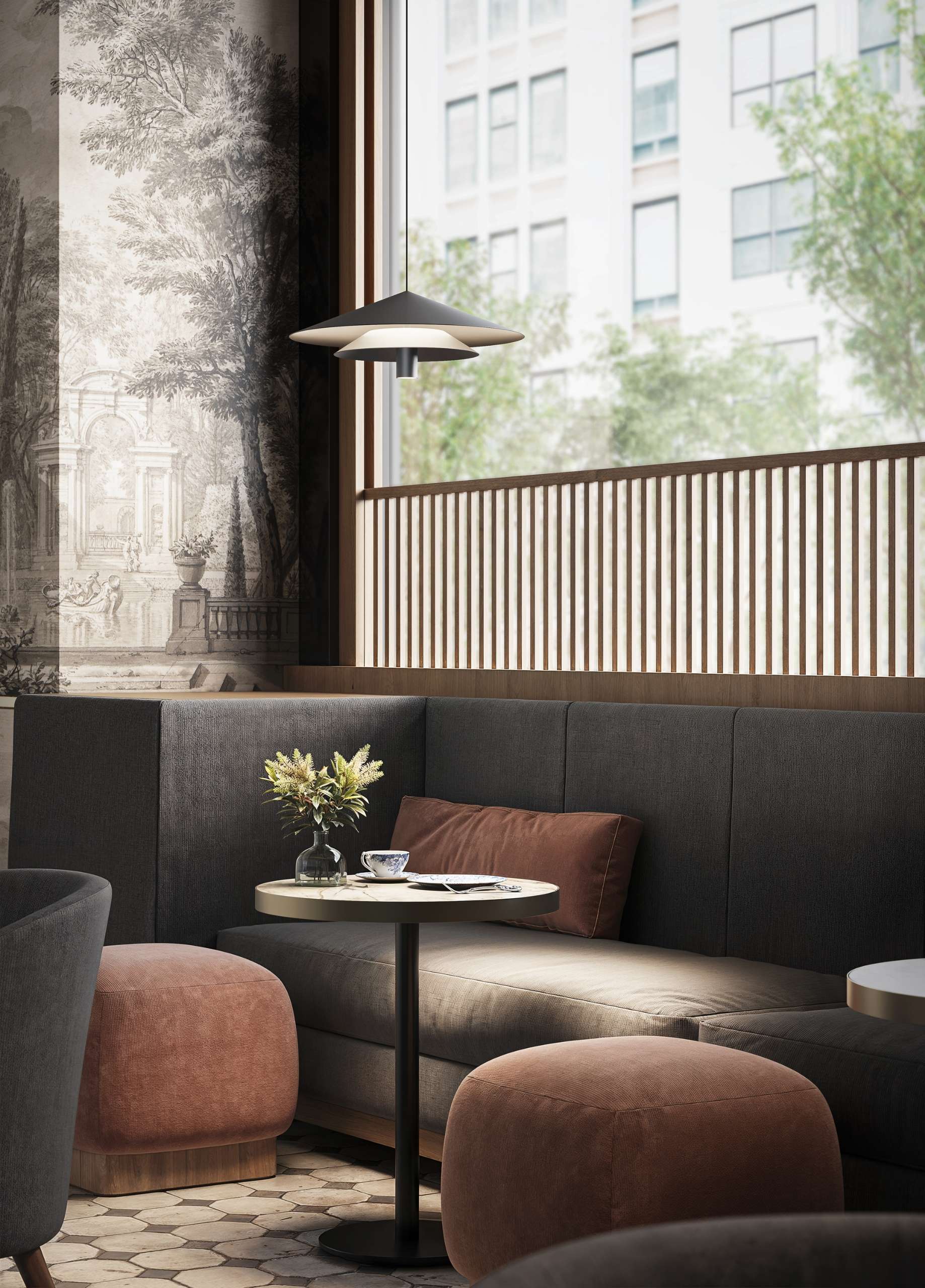 Sculptural lighting for calm, stylish lounges. The Asso pendant by Bellucci Mazzoni for Karman brings quiet sophistication to relaxed spaces with its soft glow and graphic silhouette.