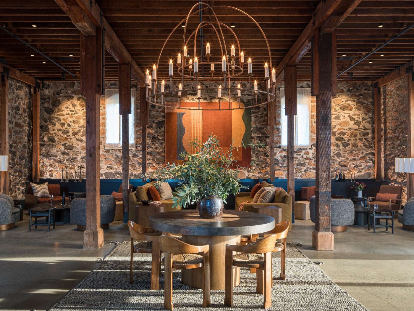 In the heart of St. Helena, California, a historic 2,000-square-foot stone building has been reimagined as a wine tasting room that captures the essence of both European refinement and Napa Valley’s rustic charm.