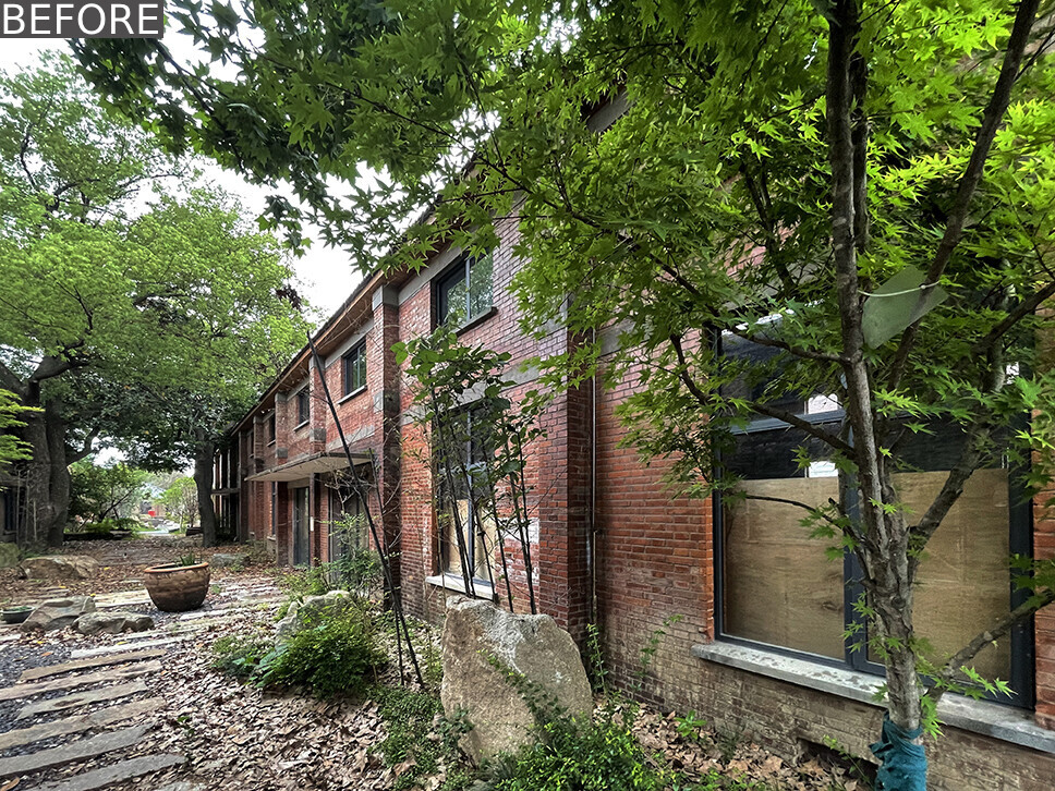 BEFORE - An original 1950s red-brick warehouse, before it was renovated into a modern cafe.
