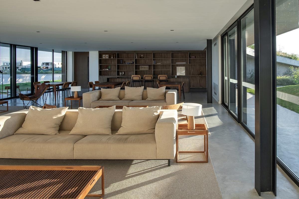 This modern clubhouse interior is designed to feel like a true extension of the neighborhood, flexible, warm, and filled with natural light. The layout is clear and uncluttered, with a variety of seating areas. Just like the exterior, the interior is minimal but considered, built to support both planned events and spontaneous interactions.