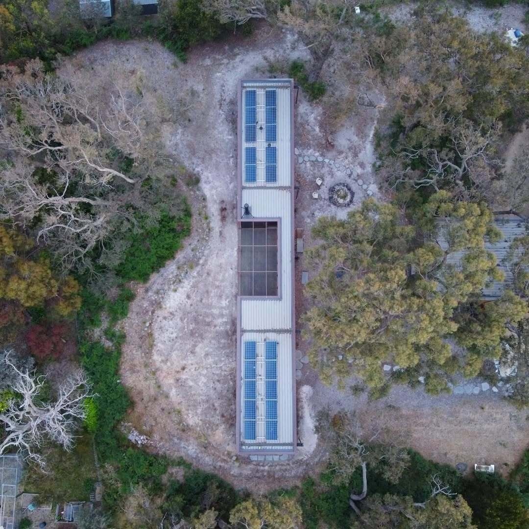 A modern house with solar panels.