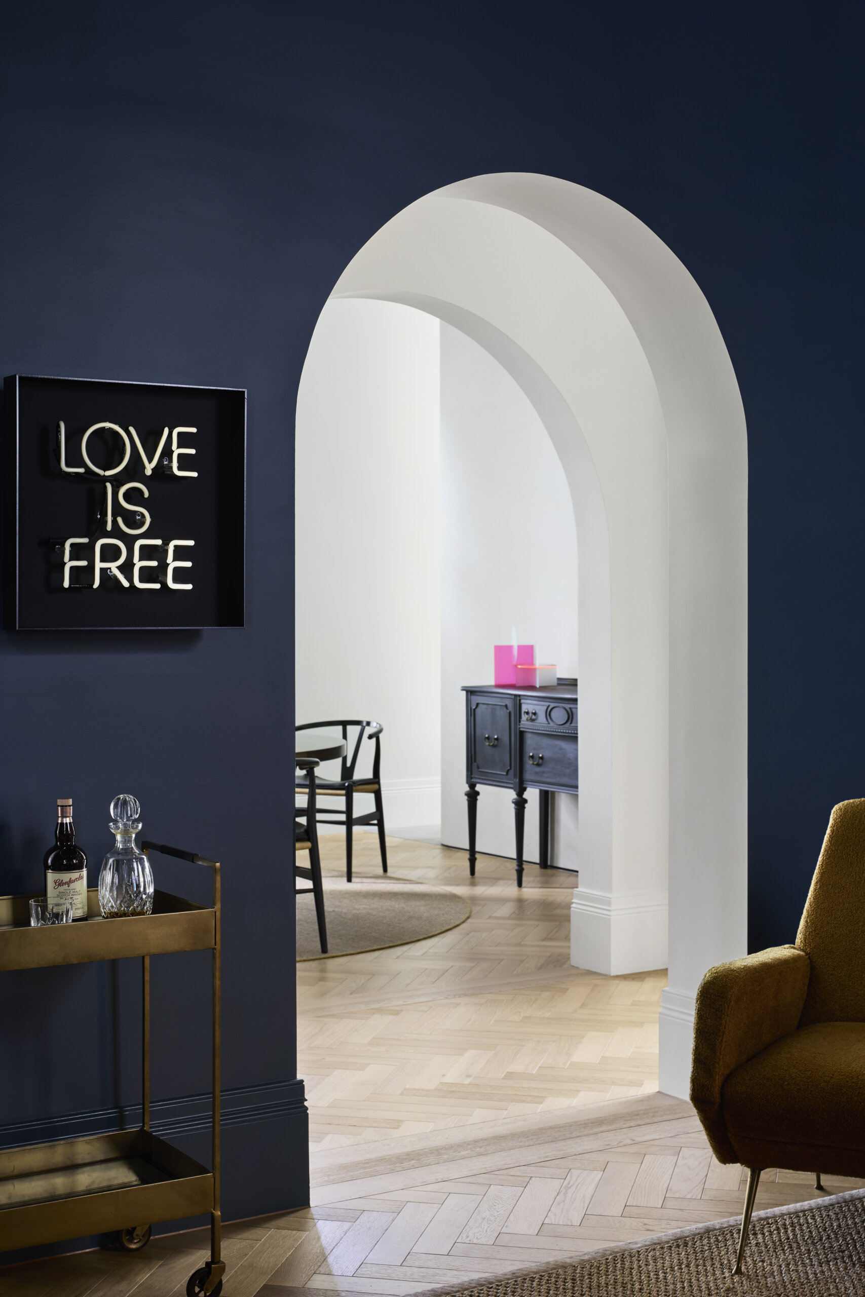 Arched details pair the heritage bones of the house with more contemporary gestures. They serve as thresholds between old and new, softening transitions and adding sculptural interest for the dining room and sitting room.