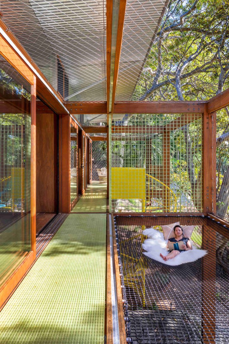 Above the Ground, Among the Leaves: A Modest Prefab Timber Home in the ...