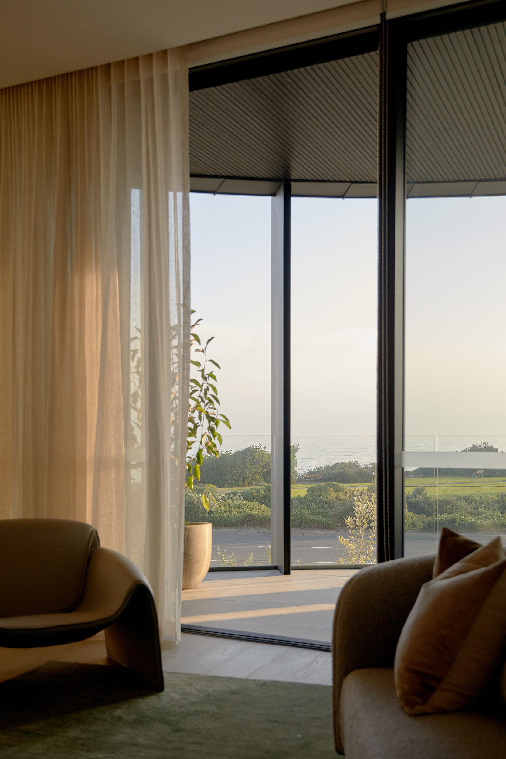 Inside this apartment, the interiors feel just as considered as the architecture. There’s a strong focus on craftsmanship, with bespoke joinery and natural materials used throughout. The layouts take advantage of the site’s green spine, offering multiple aspects to the beach and garden, great natural light, and passive airflow.