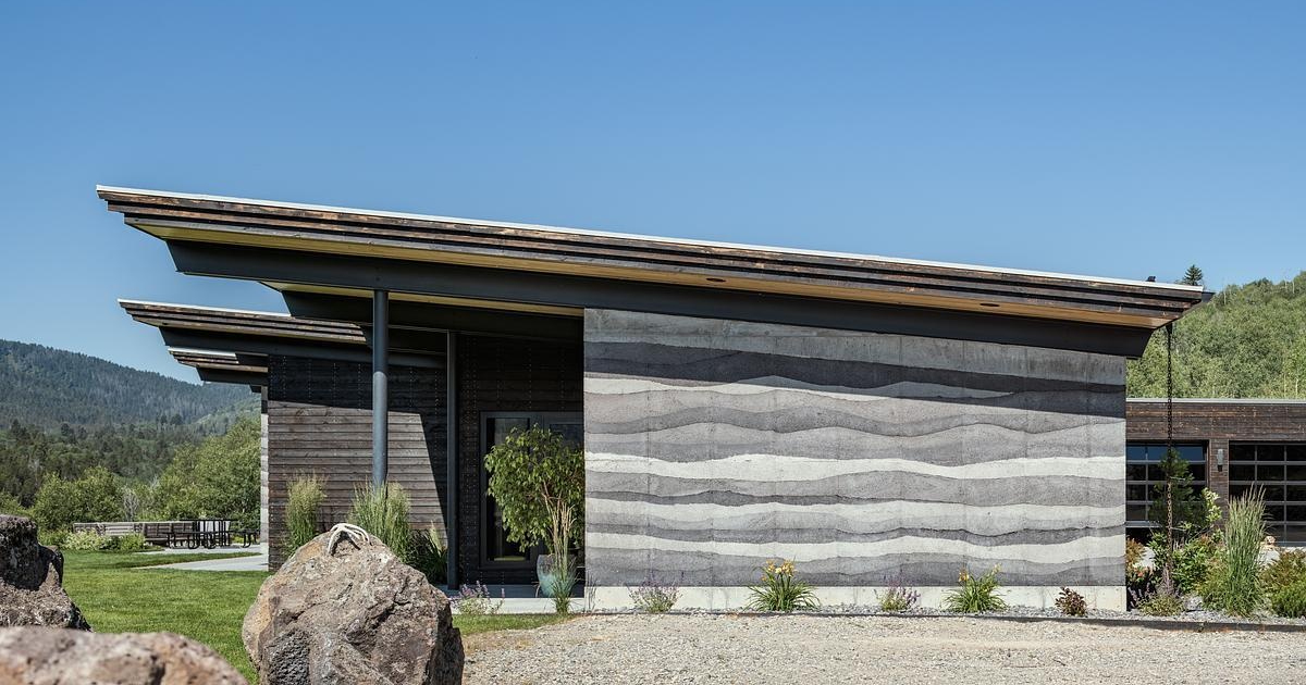 The Beauty of Rammed Earth Walls in a Modern Mountain House