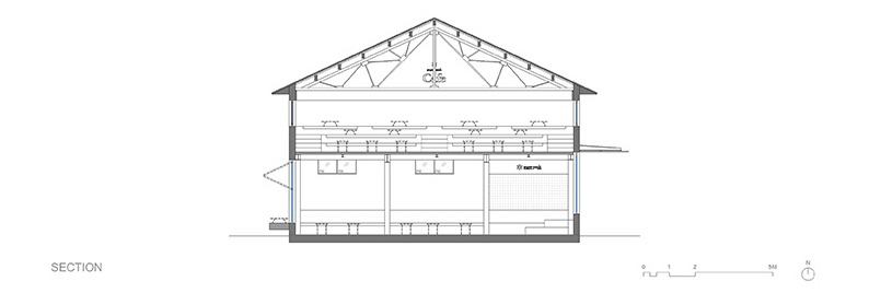The architectural drawings outline how a 1950s red-brick warehouse was restructured into a modern cafe without compromising its original form.