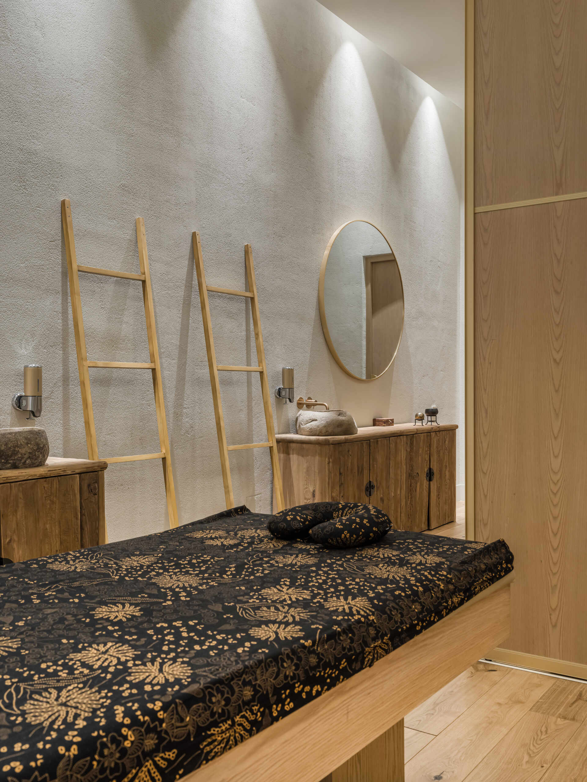 Step into a sensory cocoon on the first floor of SIAM SPA, where flowing corridors, sand-toned textures, and curved walls evoke the feeling of a peaceful, natural cave. Intimate lighting and tactile materials create a tranquil setting for massage and deep relaxation.