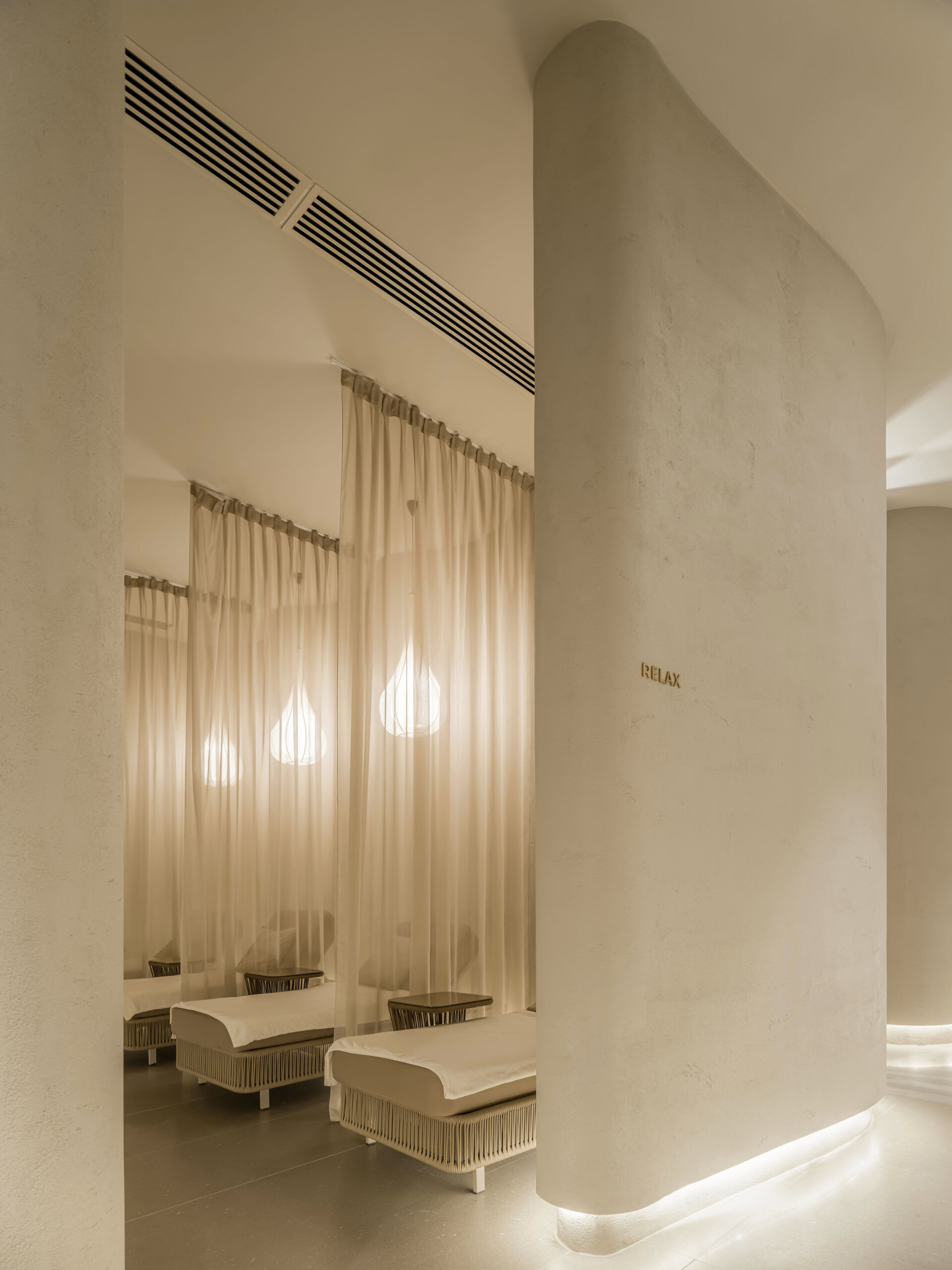 Step into a sensory cocoon on the first floor of SIAM SPA, where flowing corridors, sand-toned textures, and curved walls evoke the feeling of a peaceful, natural cave. Intimate lighting and tactile materials create a tranquil setting for massage and deep relaxation.