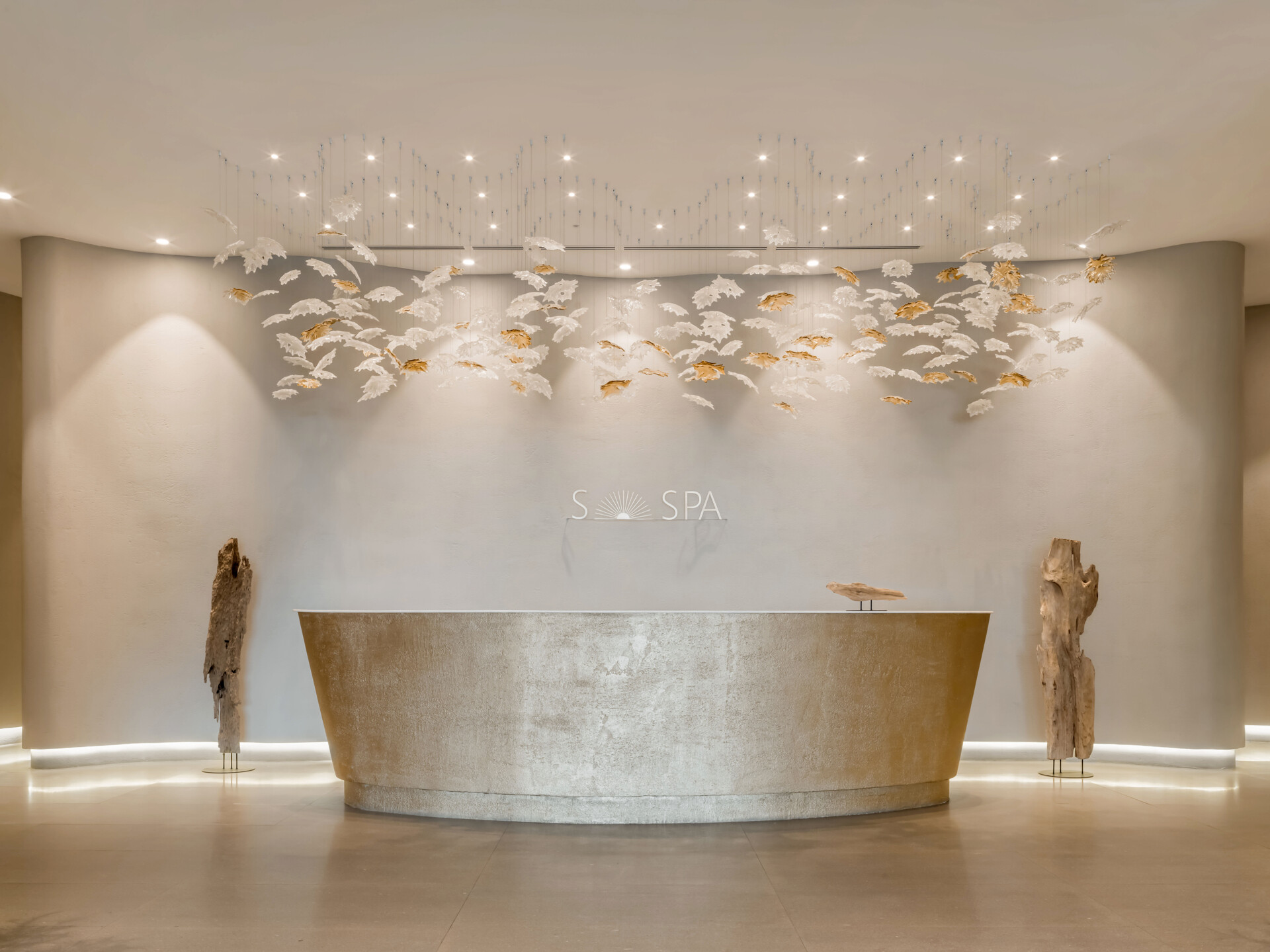 Step into a sensory cocoon on the first floor of SIAM SPA, where flowing corridors, sand-toned textures, and curved walls evoke the feeling of a peaceful, natural cave. Intimate lighting and tactile materials create a tranquil setting for massage and deep relaxation.