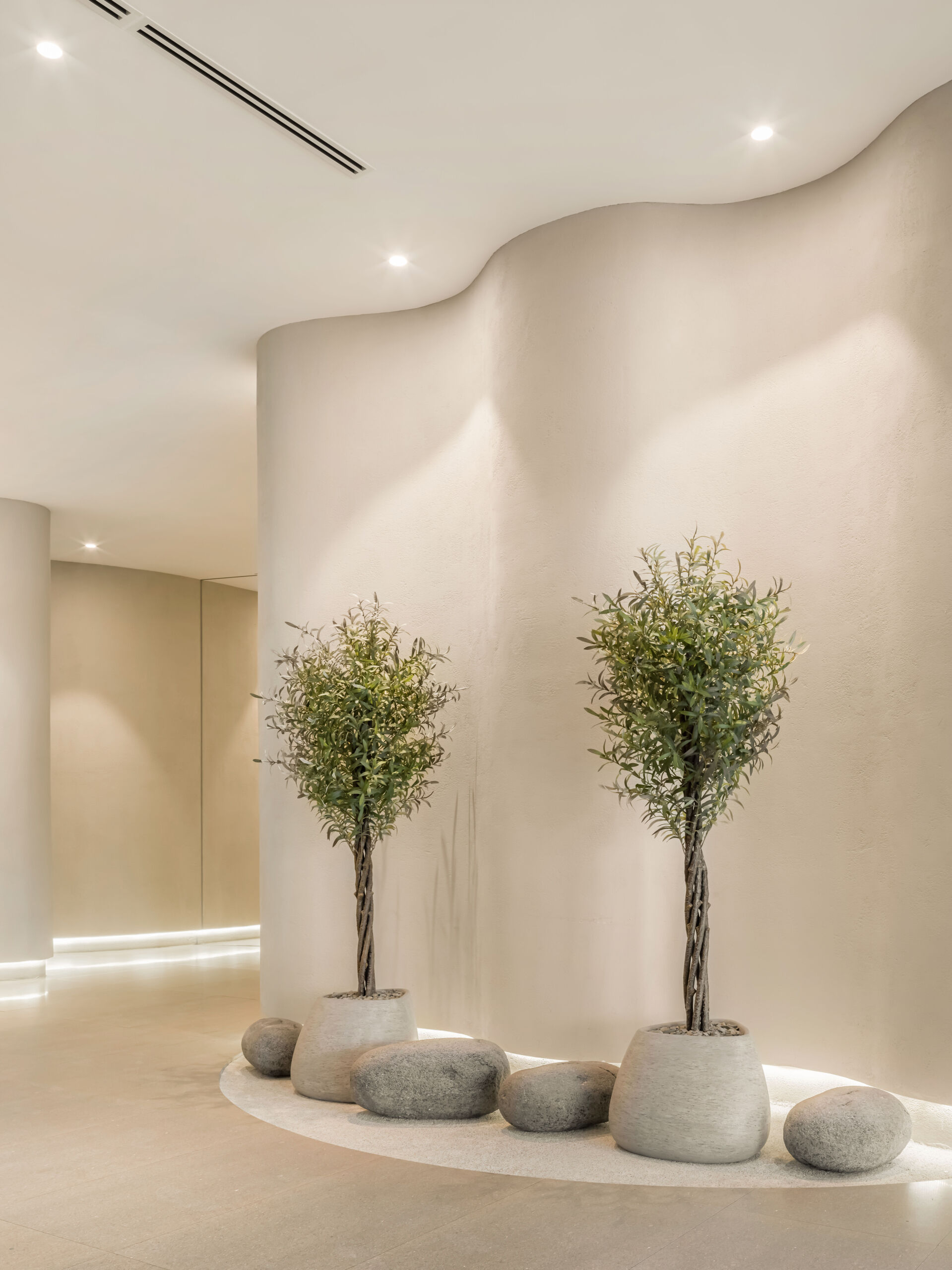 Step into a sensory cocoon on the first floor of SIAM SPA, where flowing corridors, sand-toned textures, and curved walls evoke the feeling of a peaceful, natural cave. Intimate lighting and tactile materials create a tranquil setting for massage and deep relaxation.