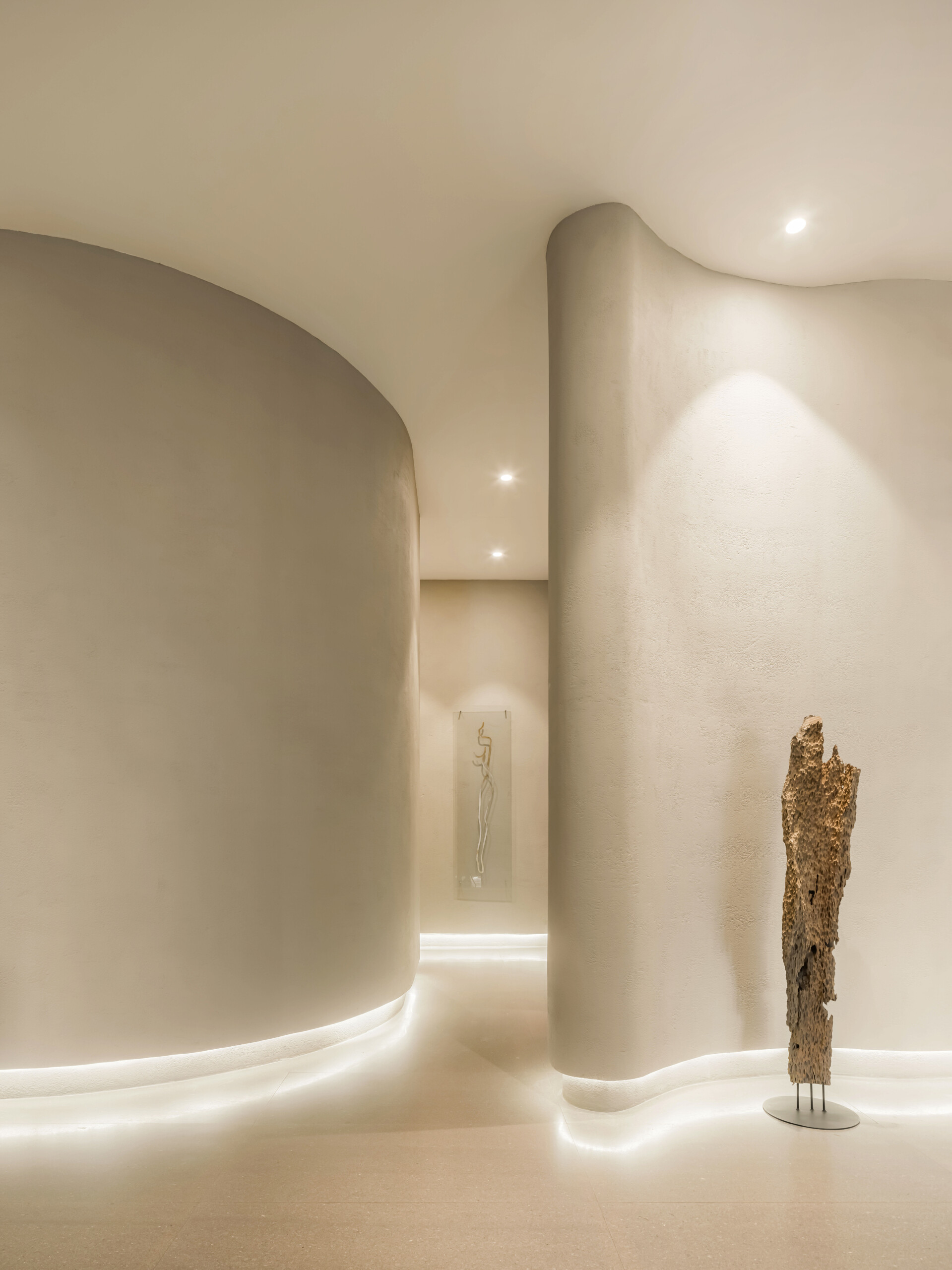 Step into a sensory cocoon on the first floor of SIAM SPA, where flowing corridors, sand-toned textures, and curved walls evoke the feeling of a peaceful, natural cave. Intimate lighting and tactile materials create a tranquil setting for massage and deep relaxation.