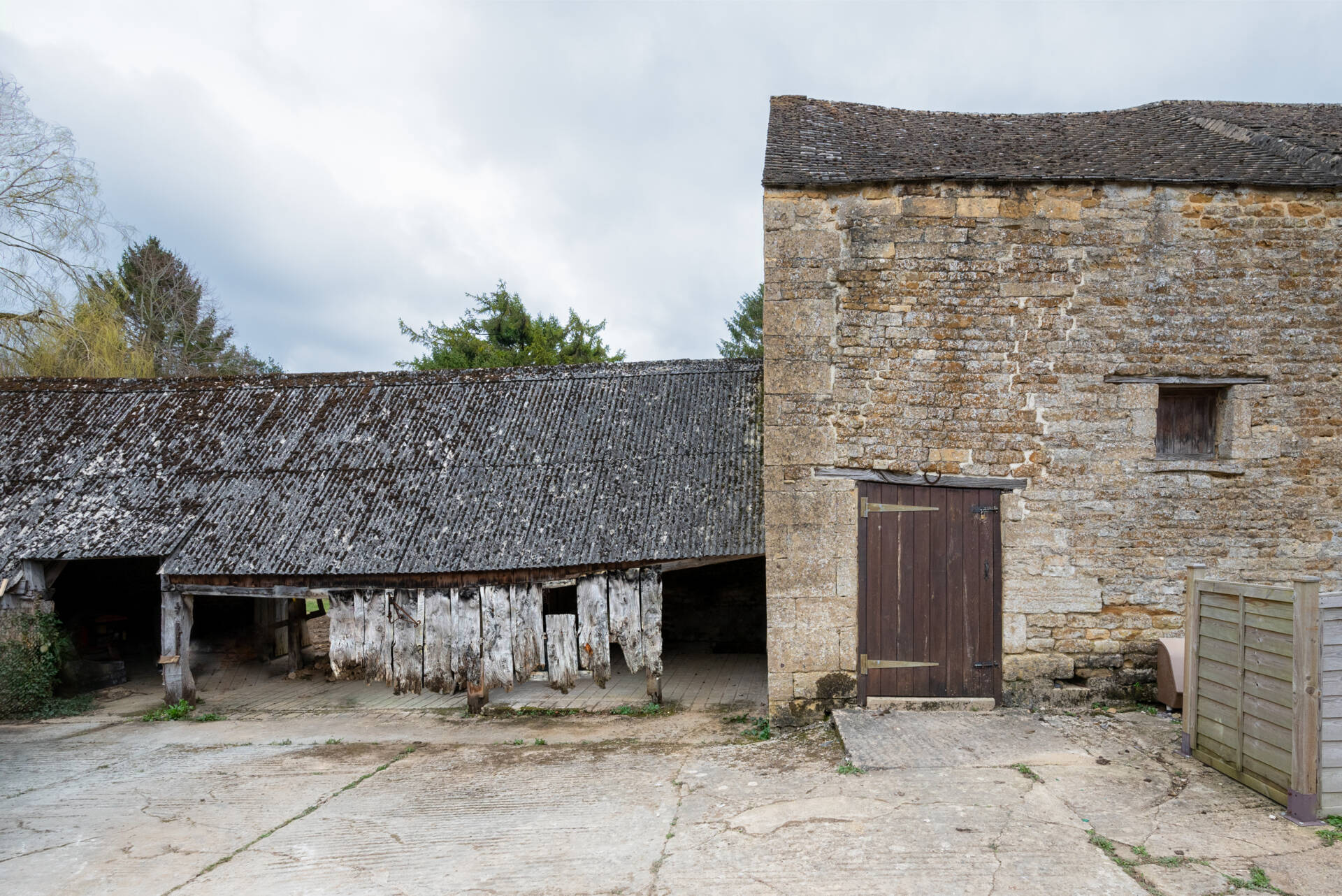This cowshed was transformed into a two bedroom home that kept some of the original features.