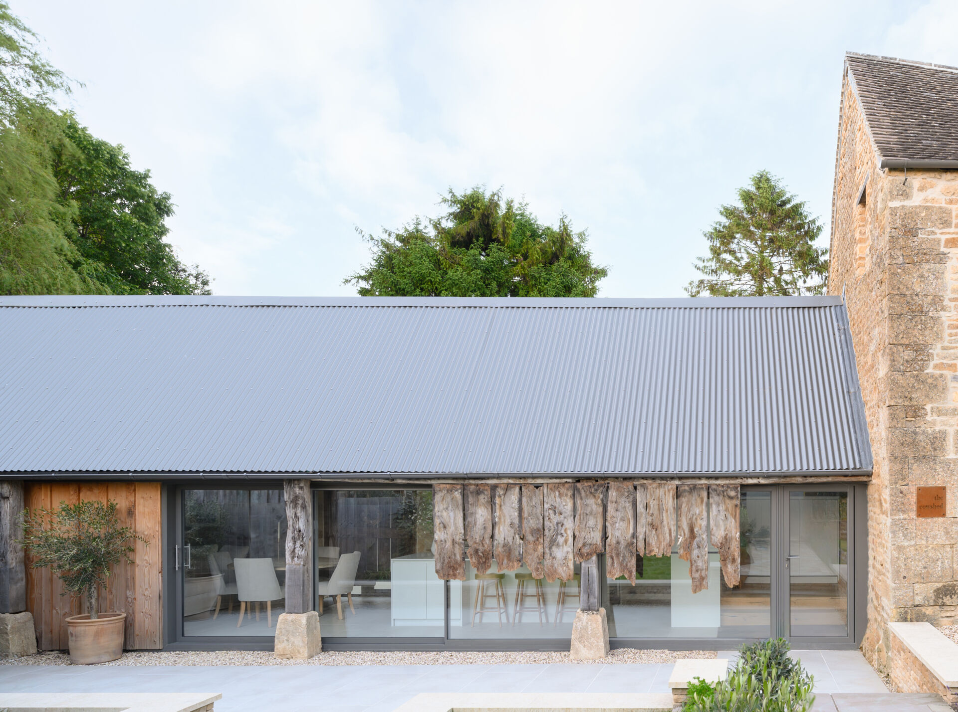 This cowshed was transformed into a two bedroom home that kept some of the original features.