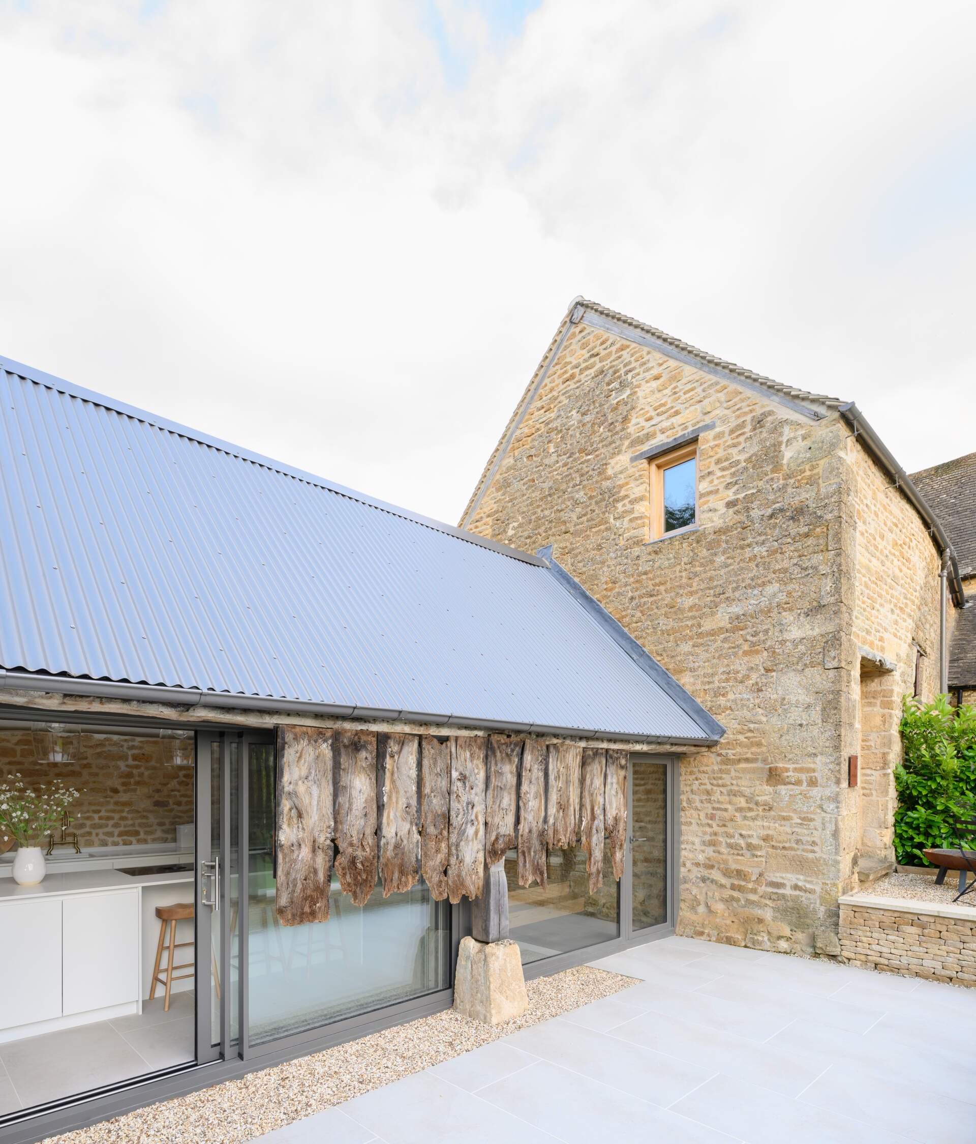 This cowshed was transformed into a two bedroom home that kept some of the original features.