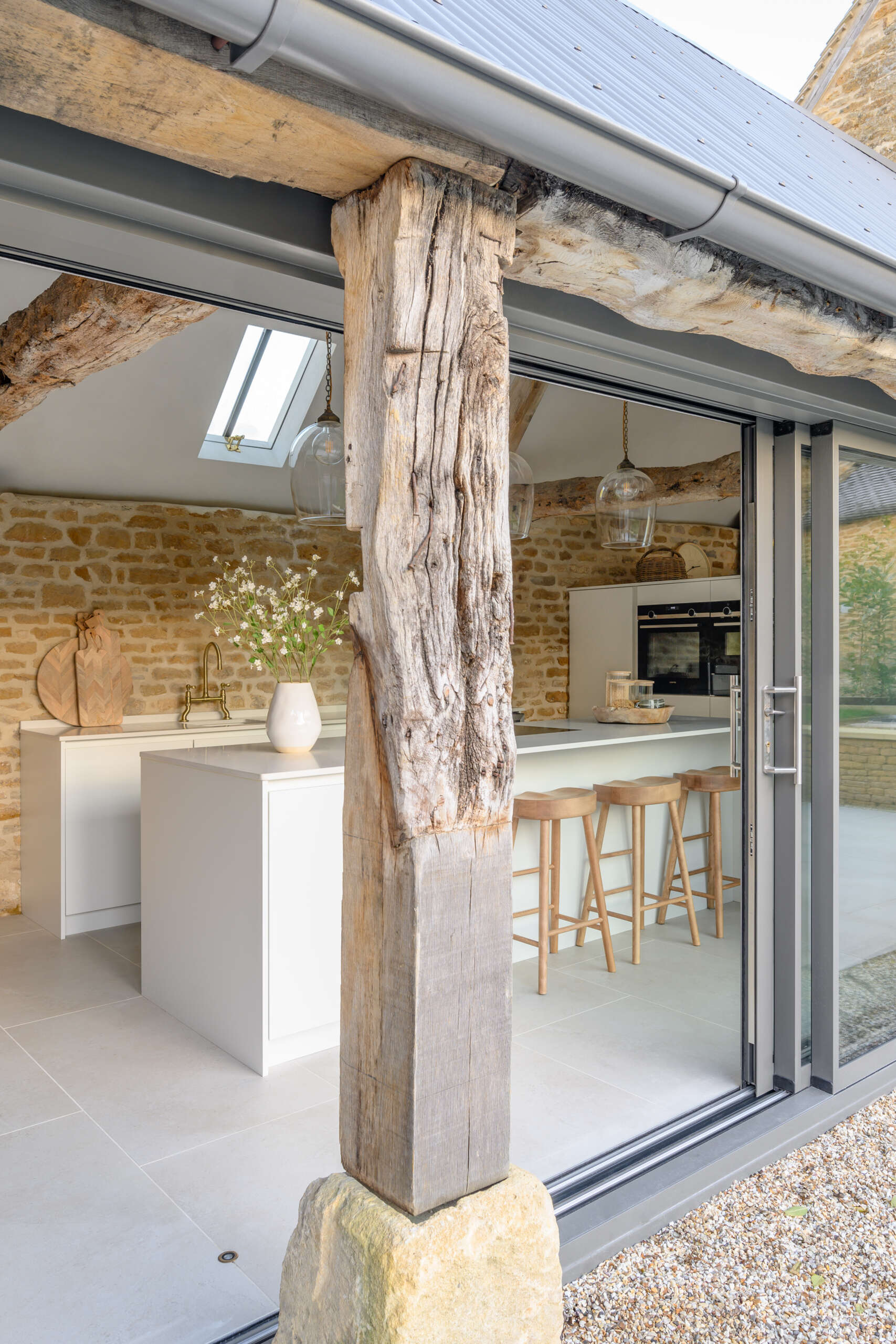This cowshed was transformed into a two bedroom home that kept some of the original features.