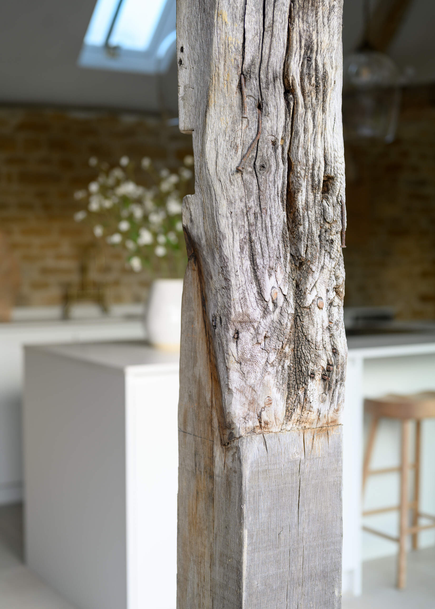 This cowshed was transformed into a two bedroom home that kept some of the original features.