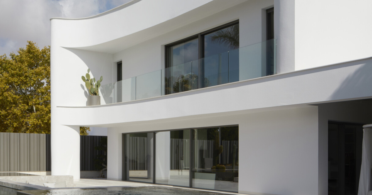 Tucked Behind This Minimalist Home Is a Backyard Oasis