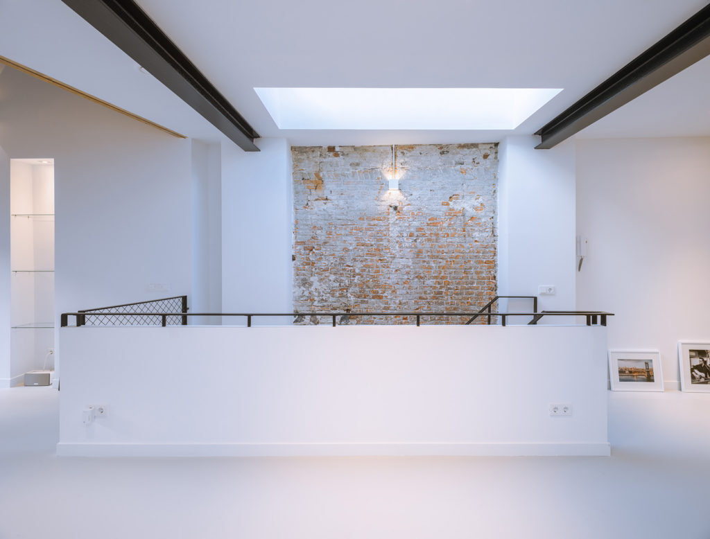Upstairs, the landing doubles as a viewing gallery, offering views across the voids and into the sky.