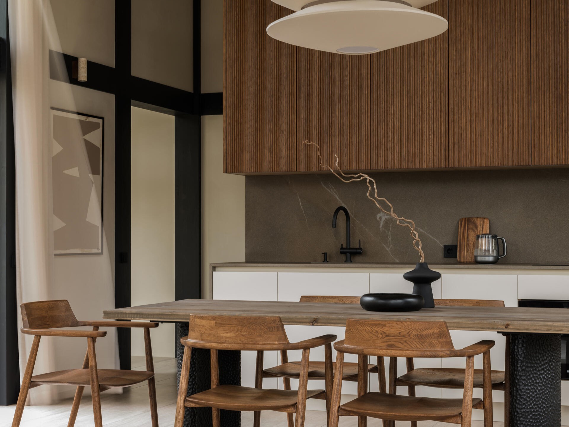 Step inside Japandi House, a calming retreat designed by Yulia Barshevskaya that blends simple materials, clean lines, and strong indoor-outdoor connection.