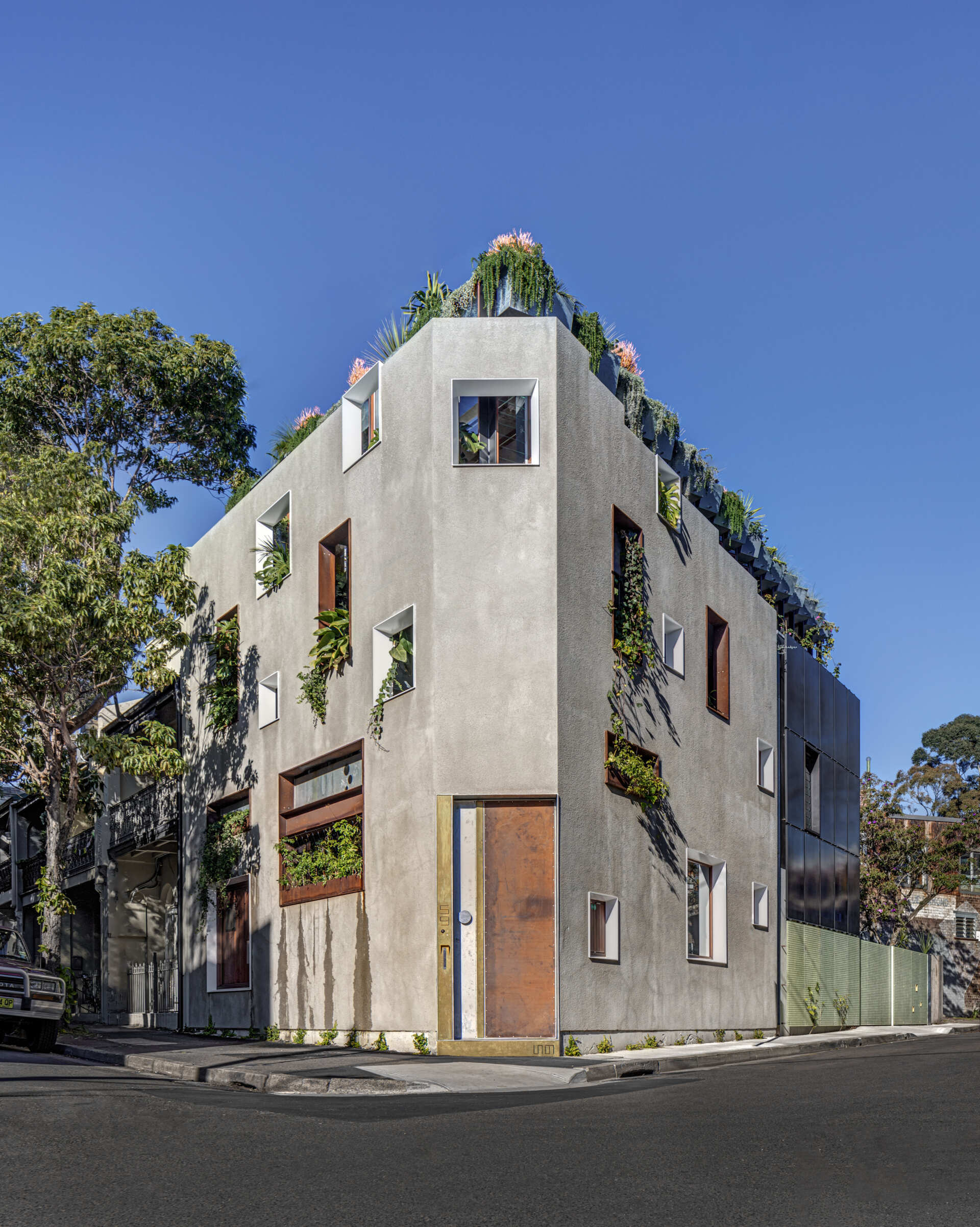 The house rises from the shell of a near-collapsing Victorian shopfront. What once stood as a disused two-storey structure has been transformed into a dynamic model for climate-conscious living. Its design is guided by principles of closed-loop sustainability, balancing high-performance systems with a respect for historical context.