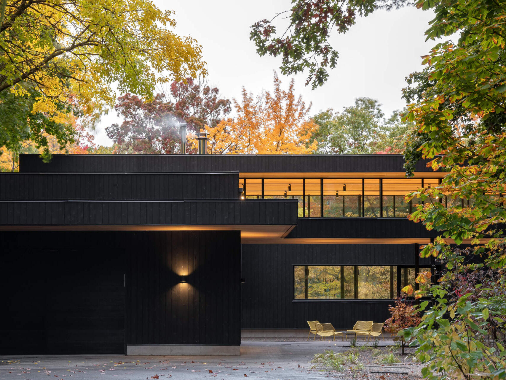 A mid-century bungalow reimagined with soaring ceilings, open spaces, and deep ties to the ravine landscape.