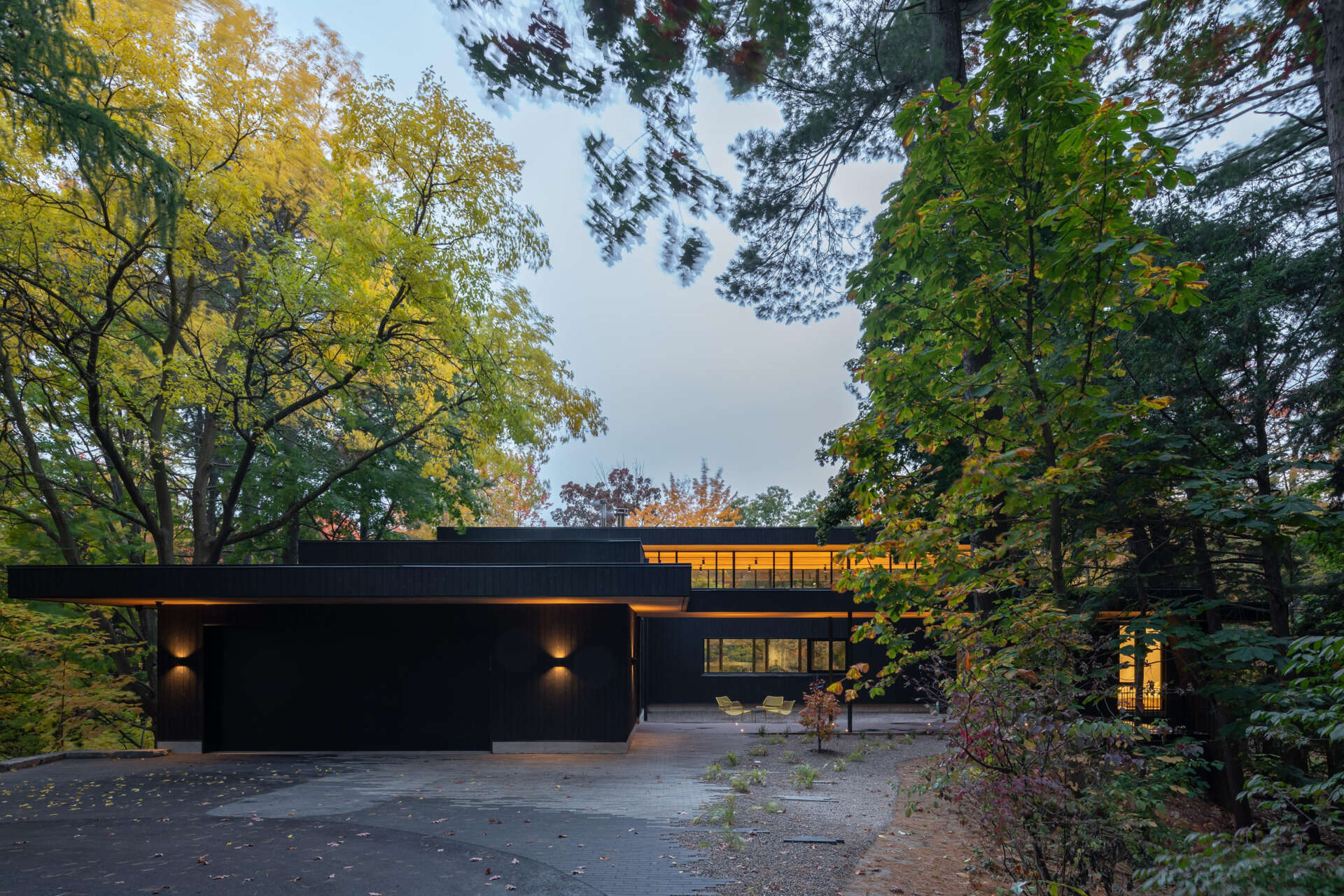 A mid-century bungalow reimagined with soaring ceilings, open spaces, and deep ties to the ravine landscape.