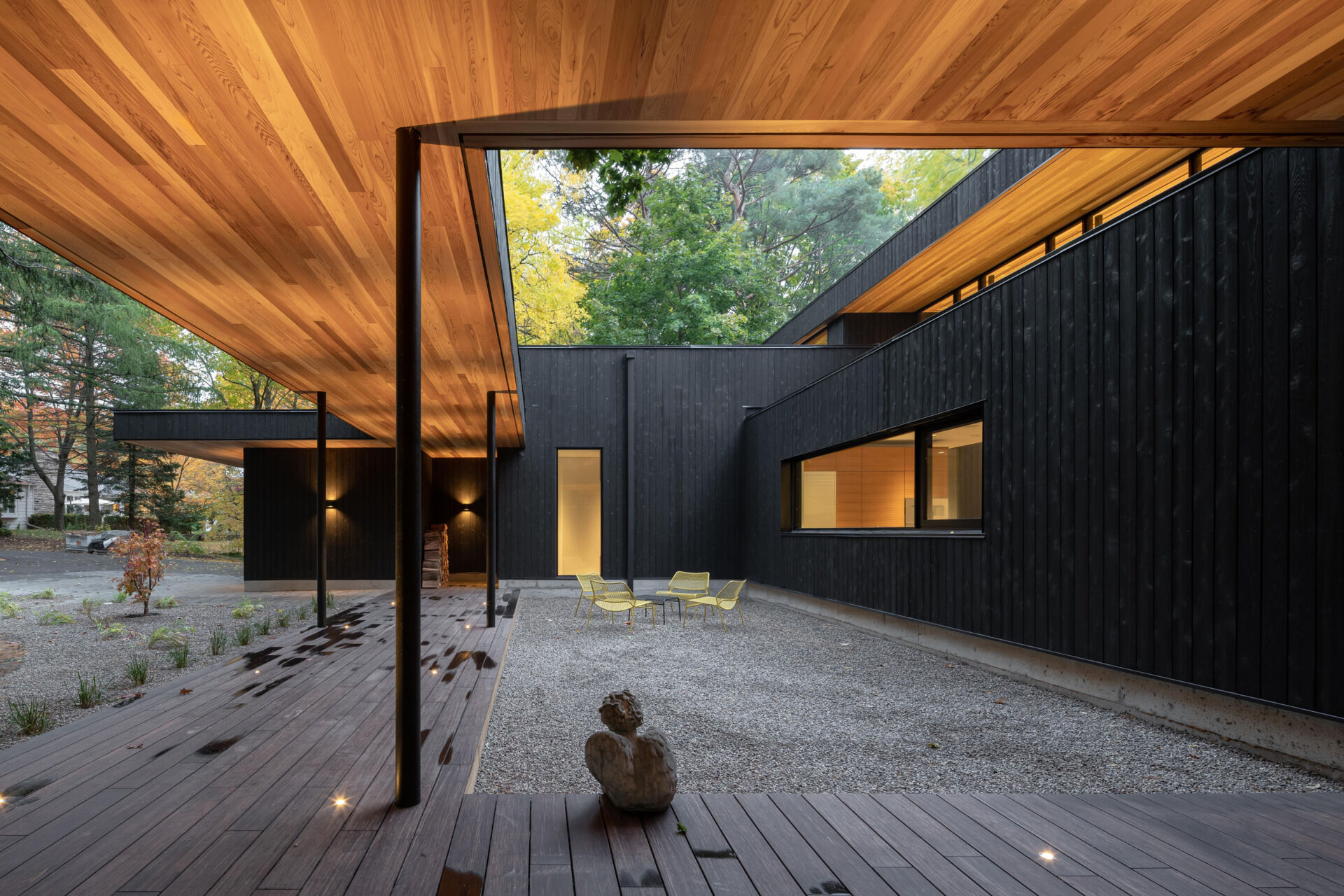 A mid-century bungalow reimagined with soaring ceilings, open spaces, and deep ties to the ravine landscape.