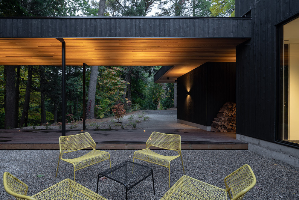 A mid-century bungalow reimagined with soaring ceilings, open spaces, and deep ties to the ravine landscape.