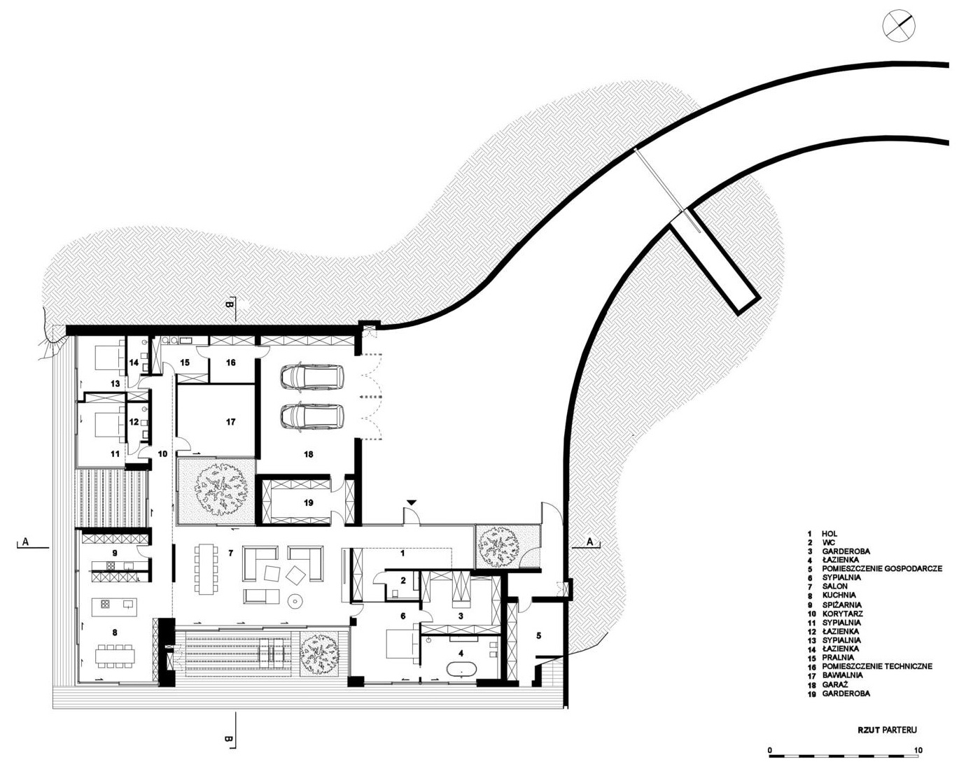 Esta casa moderna desaparece en la ladera con techos verdes, placas de acero Corten y vistas panorámicas del río.