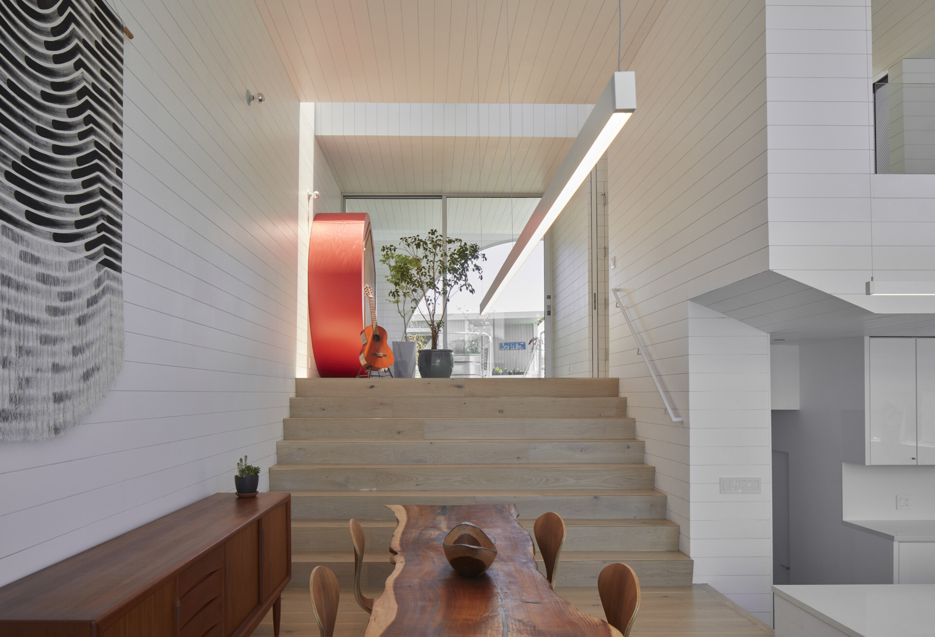 The entry welcomes you with warm natural materials and thoughtful details, setting the tone for the houseboat’s blend of cozy comfort and sleek, seaworthy design. It creates a smooth transition from dock to home, inviting you inside with effortless style.