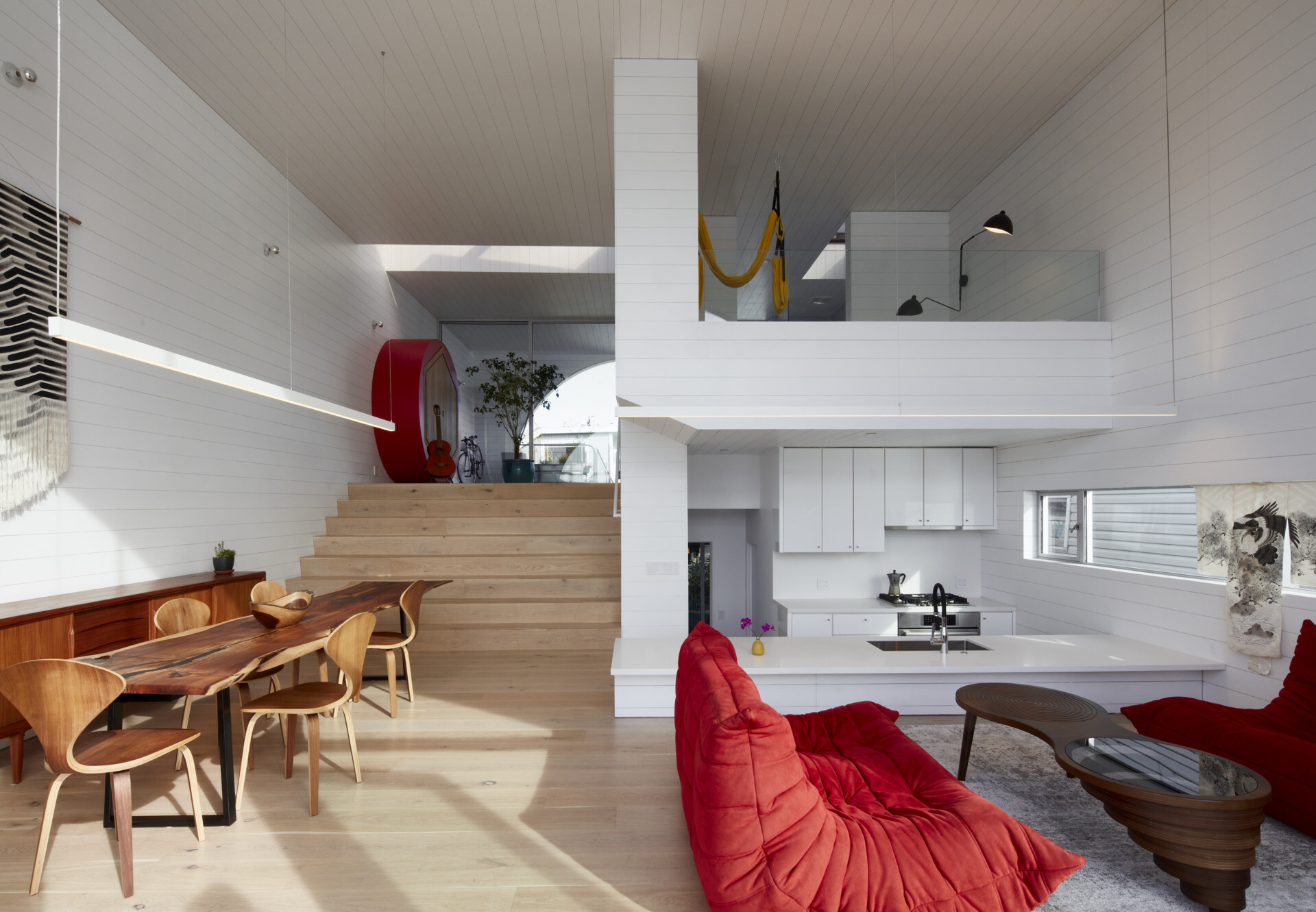 Bright and open, the living and kitchen areas of this houseboat blend seamless functionality with natural light. The efficient layout maximizes space without sacrificing comfort, creating a warm and inviting heart of the home that celebrates life on the water.