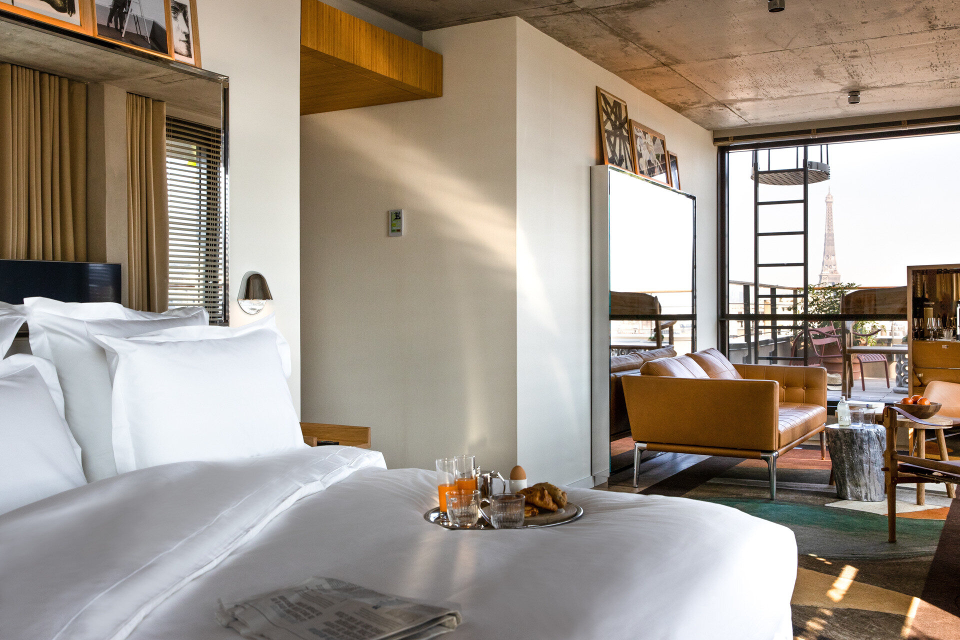 Inside Villa M, soft tones, natural materials, and Philippe Starck’s thoughtful design create calming, wellness-driven spaces. From restful hotel rooms to light-filled lounges and coworking areas, every detail invites comfort and connection.