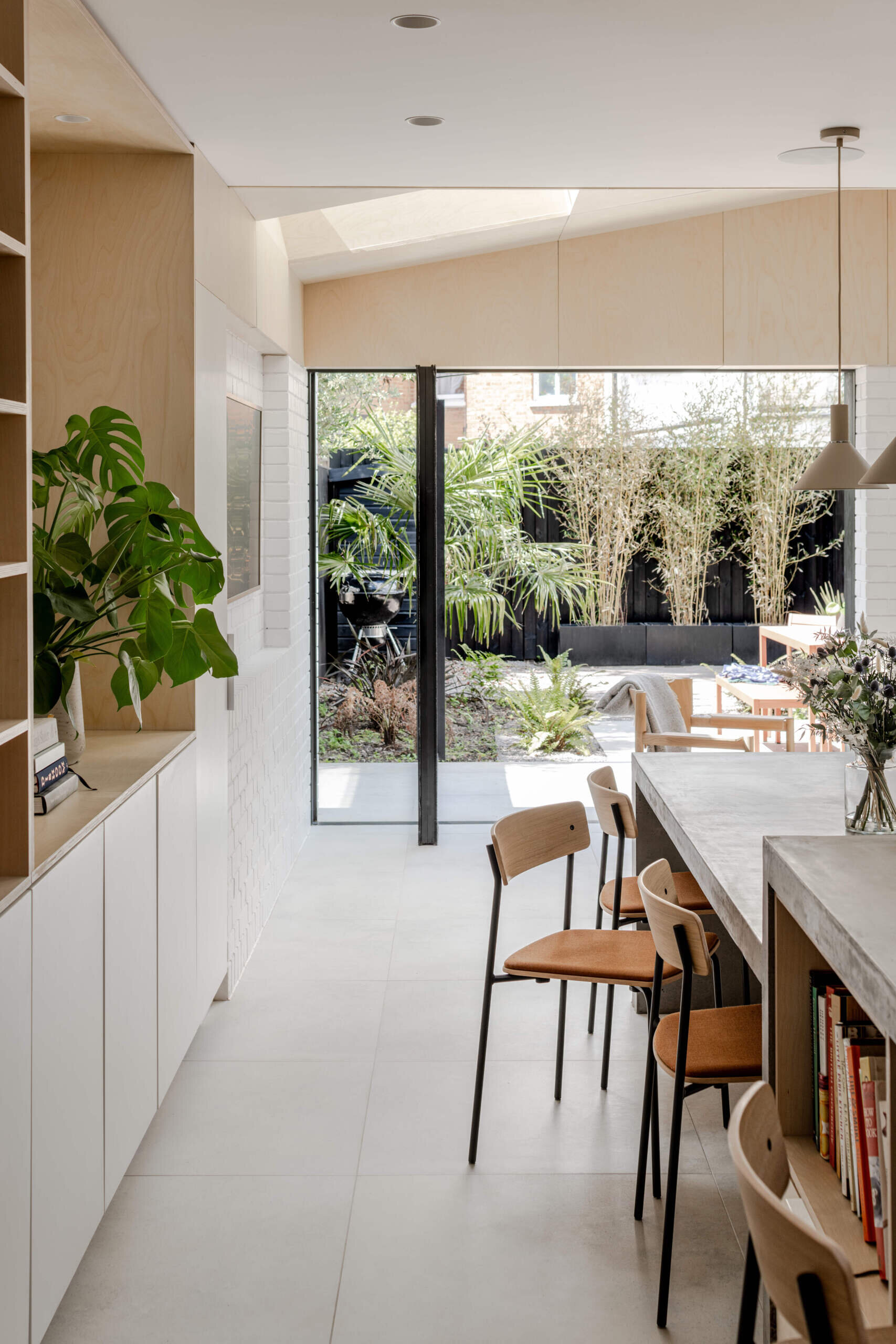The open-plan living zone feels light and grounded, with soft materials and smart detailing that elevate everyday moments.