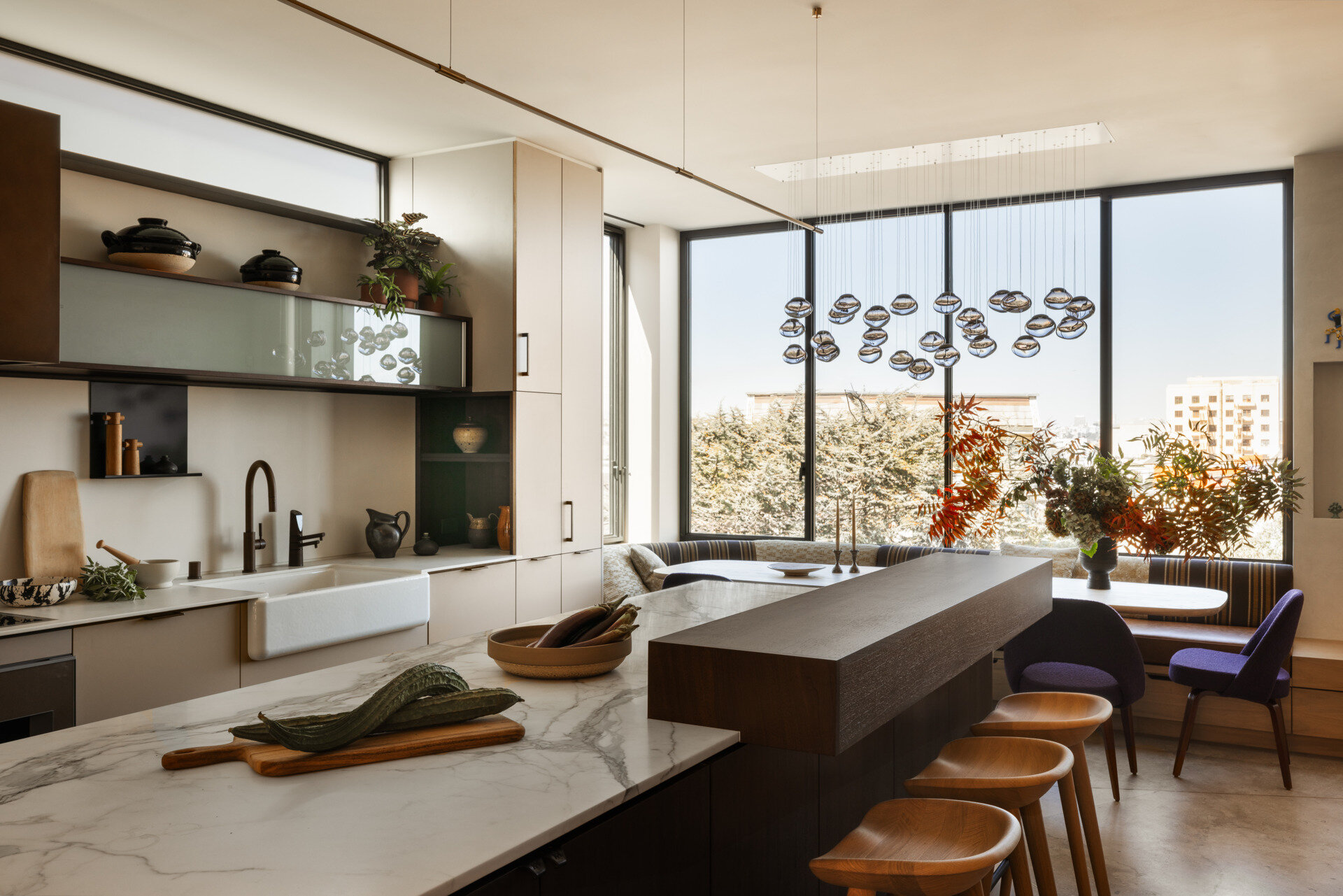 Designed by Henrybuilt, this kitchen is the true heart of the home. Its materials and layout reflect both beauty and utility, a space built for entertaining and everyday living alike. The kitchen island in particular serves as a multi-functional hub, from food prep to homework sessions.