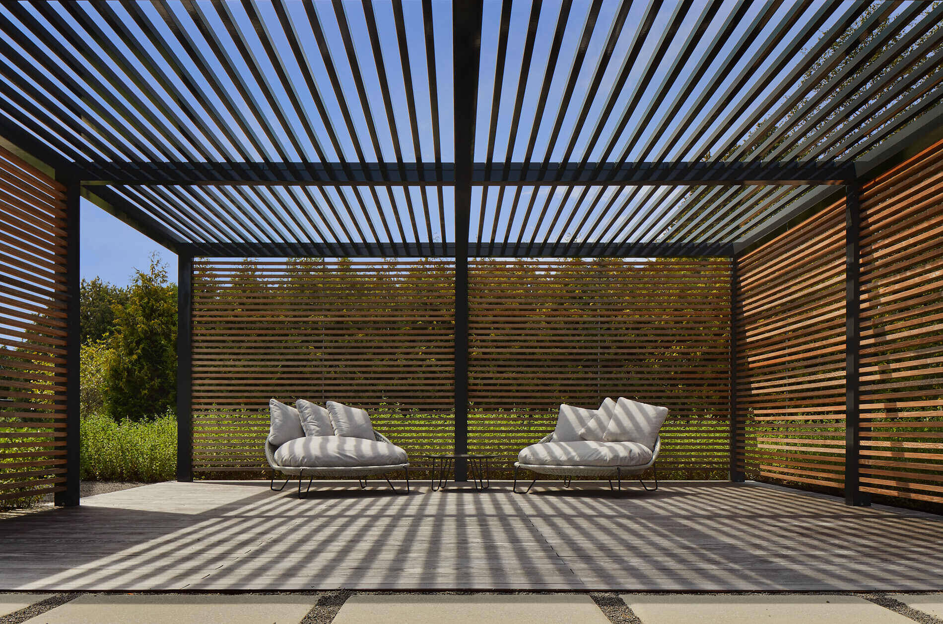 A pool and guest house sit alongside a charming cabana, ideal for slow summer days and starry nights.
