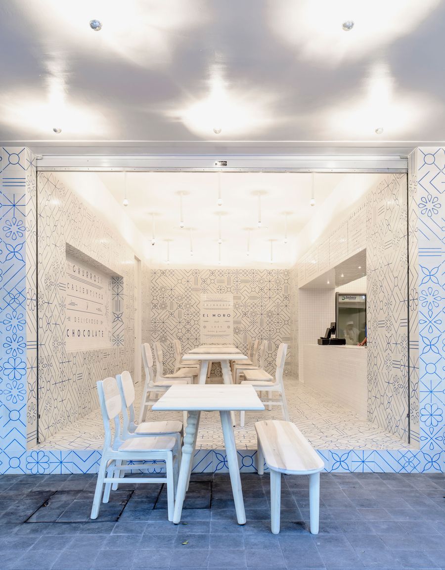 Step inside EL MORO, a historic Mexico City café reimagined with playful blue-and-white tilework, Art Deco touches, and a minimalist palette inspired by sugar and tradition.