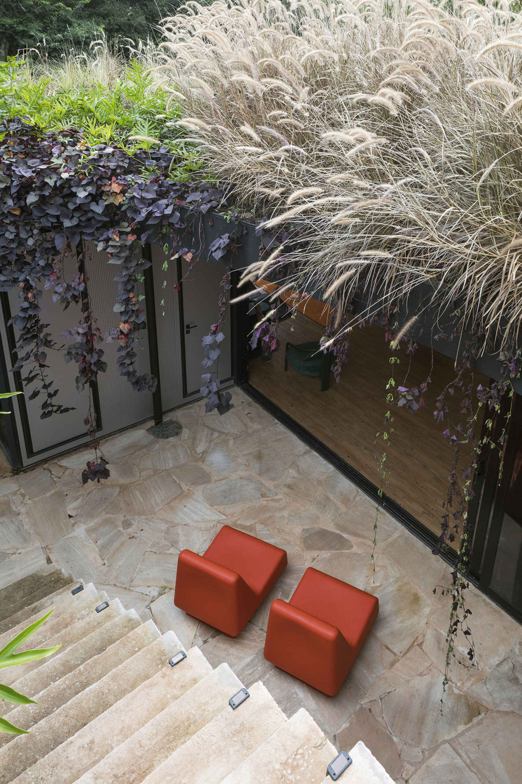 A courtyard surrounded by prefabricated modules.