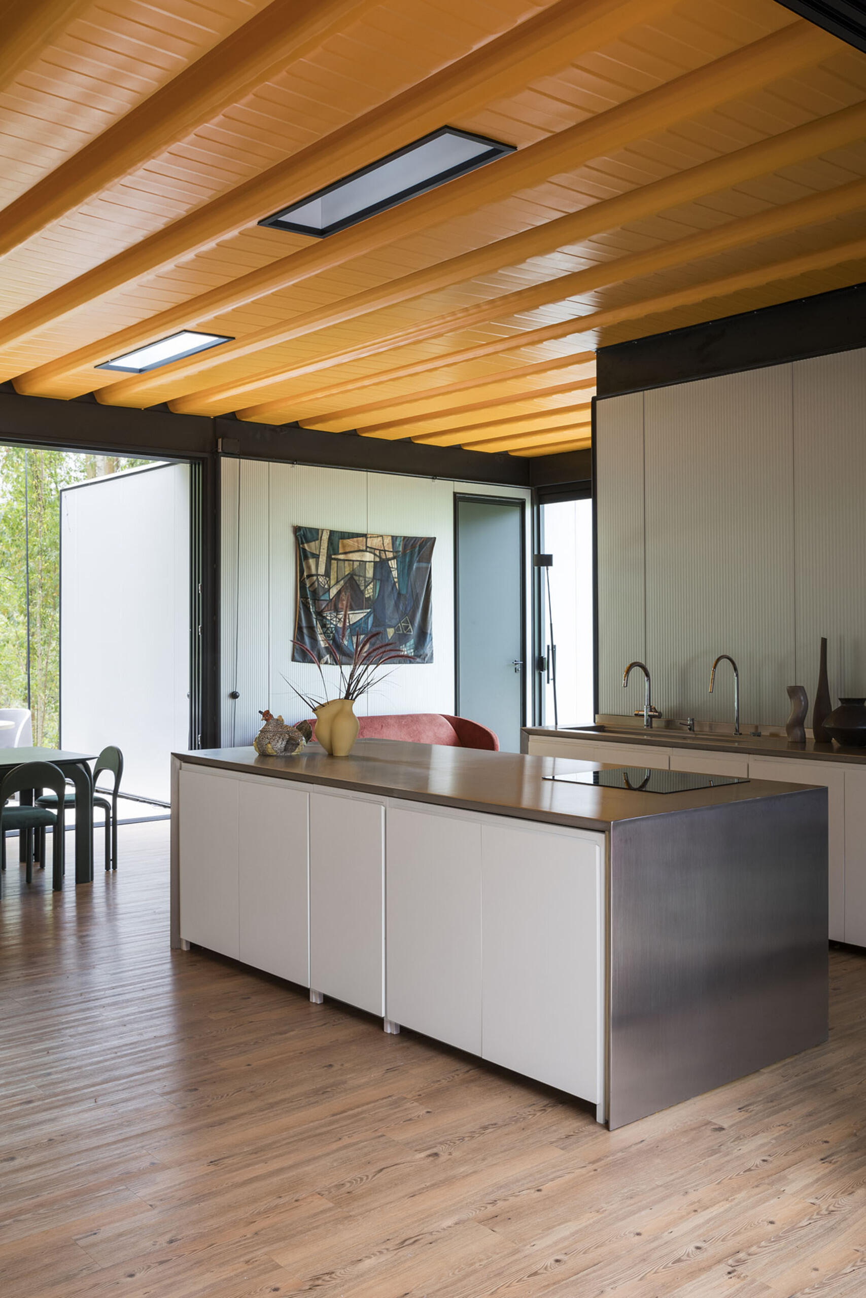 Minimal and efficient, the open kitchen keeps the layout clean and social. Simple finishes and smart design make it ideal for relaxed family cooking.