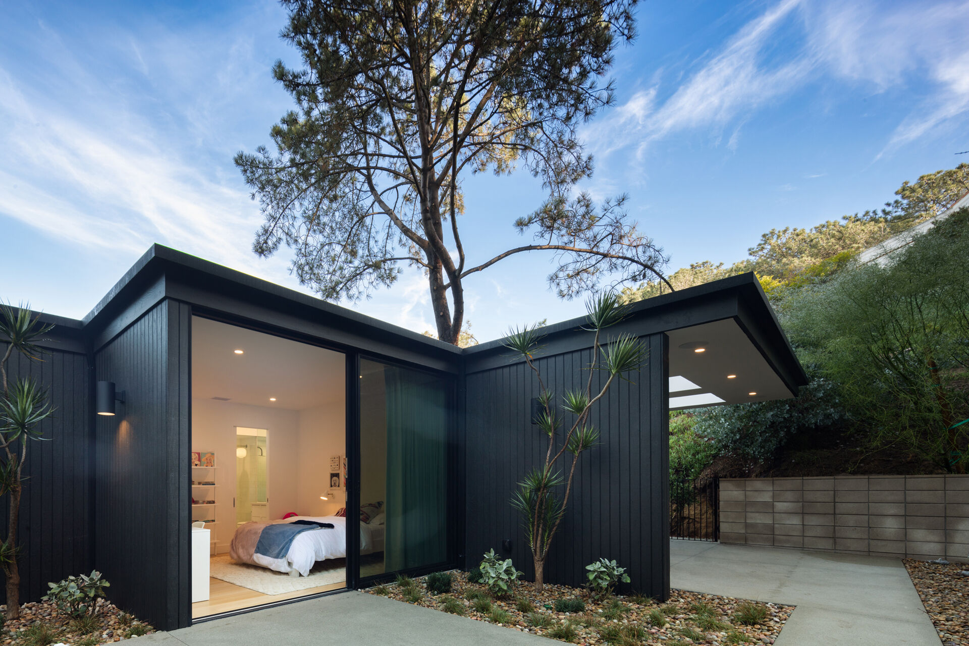 Each bedroom has direct access to patios, making the private spaces as connected to nature as the public ones.