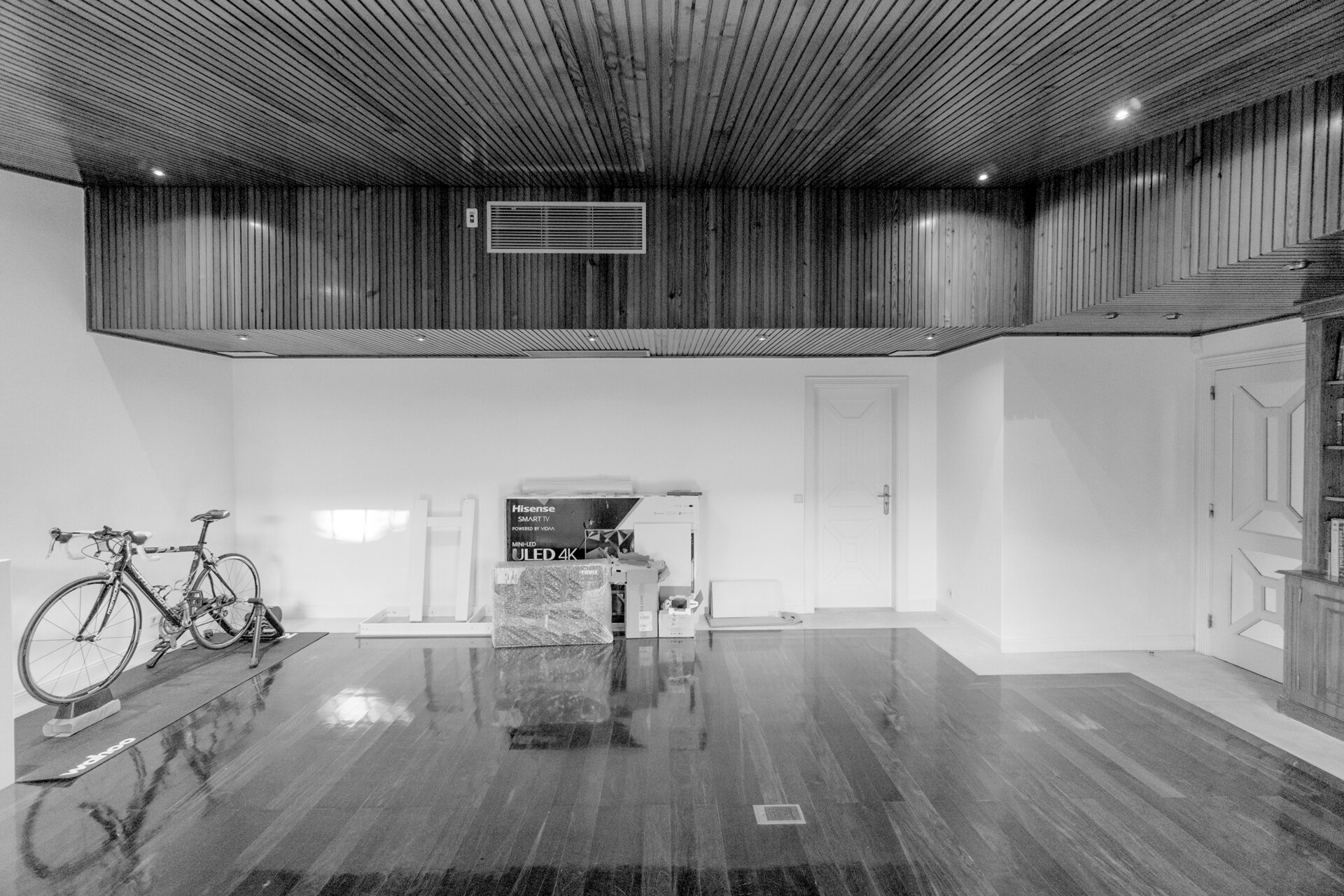 Before Kitchen Renovation - A spacious room with timber-lined floors and ceiling once felt underutilized, lacking a clear purpose or defined function.